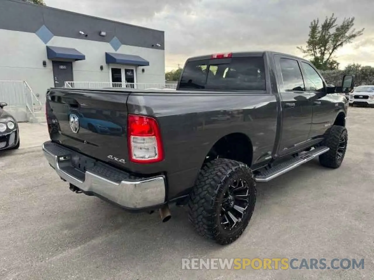 3 Photograph of a damaged car 3C6UR5CJ6KG710051 RAM 2500 2019