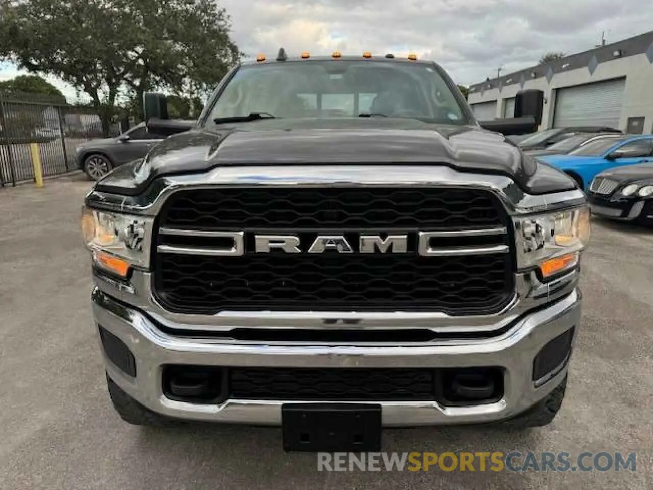 5 Photograph of a damaged car 3C6UR5CJ6KG710051 RAM 2500 2019