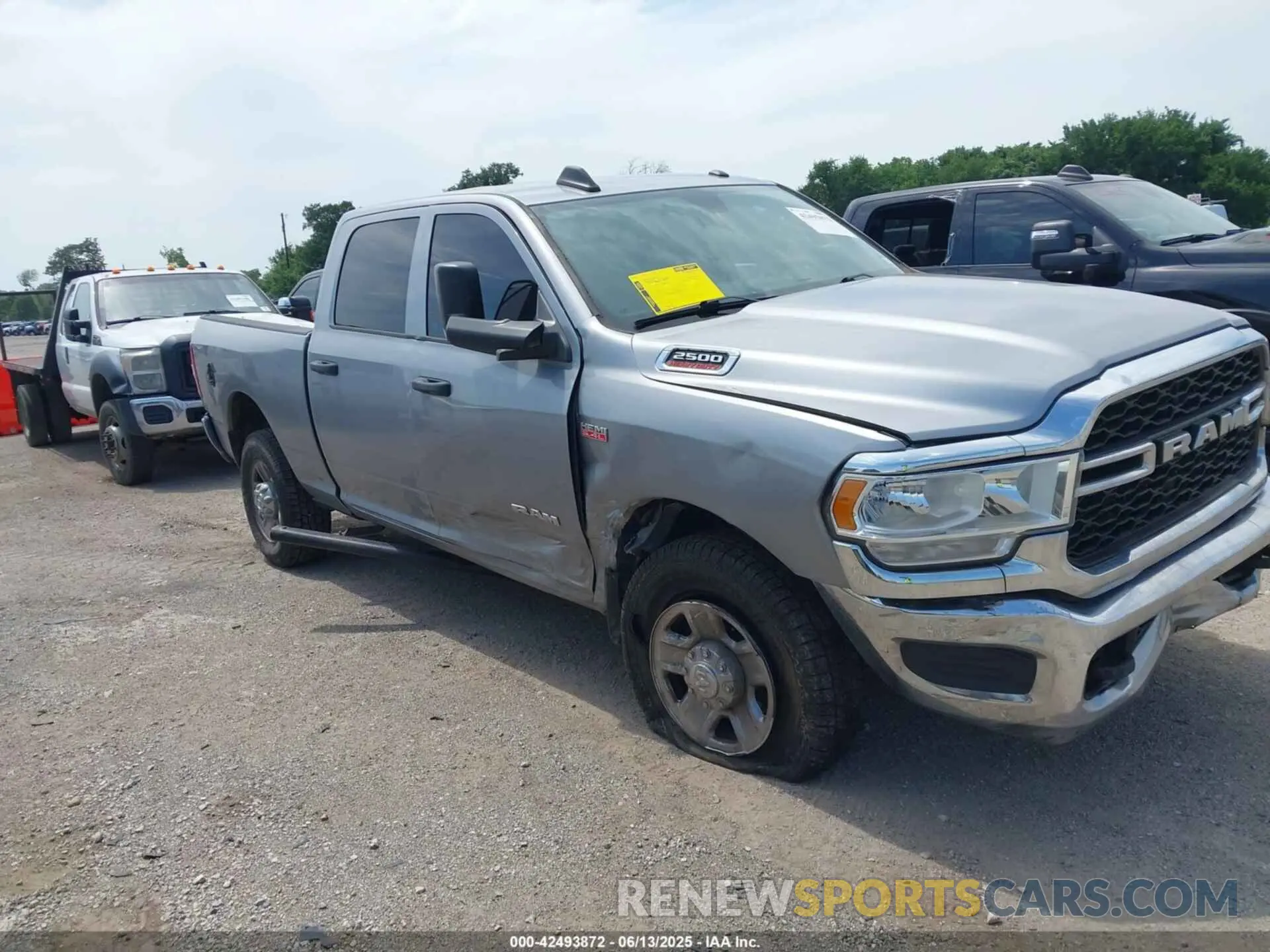 1 Photograph of a damaged car 3C6UR5CJ9KG634776 RAM 2500 2019