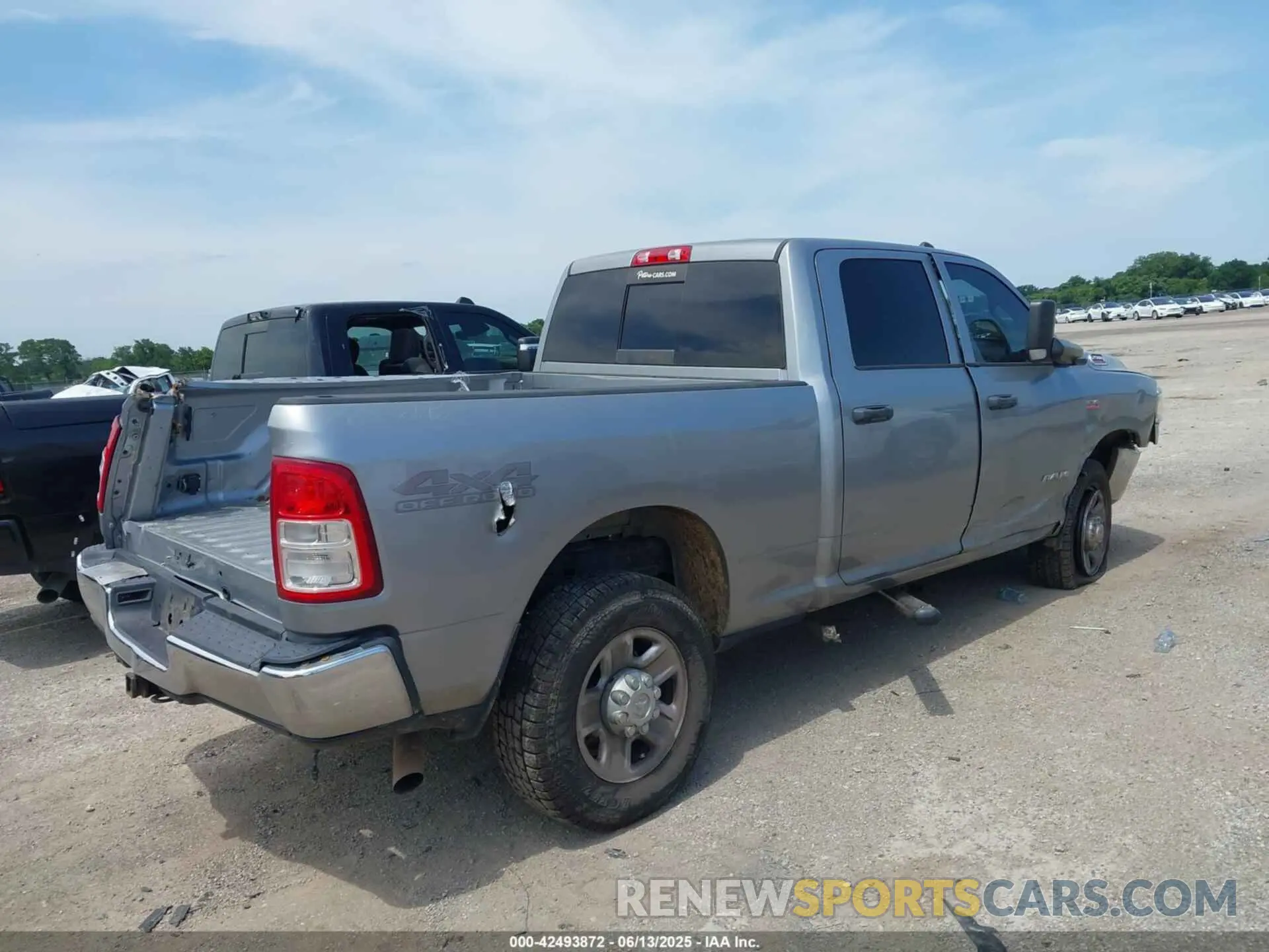4 Photograph of a damaged car 3C6UR5CJ9KG634776 RAM 2500 2019