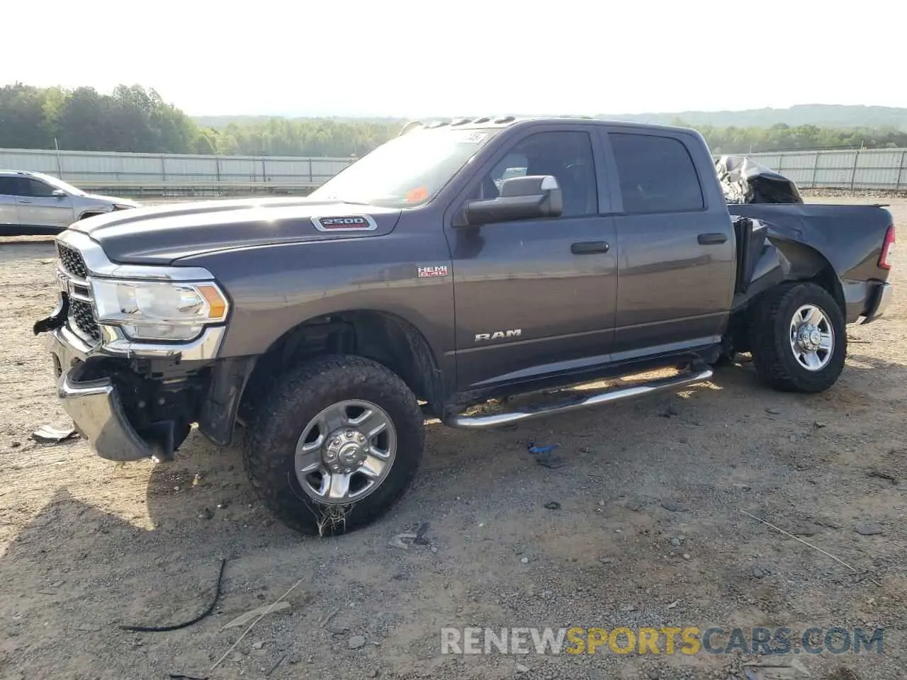 1 Photograph of a damaged car 3C6UR5CJXKG676955 RAM 2500 2019
