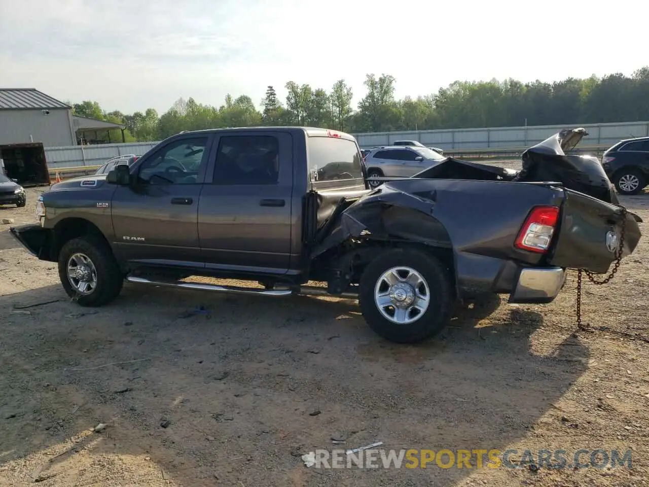 2 Photograph of a damaged car 3C6UR5CJXKG676955 RAM 2500 2019