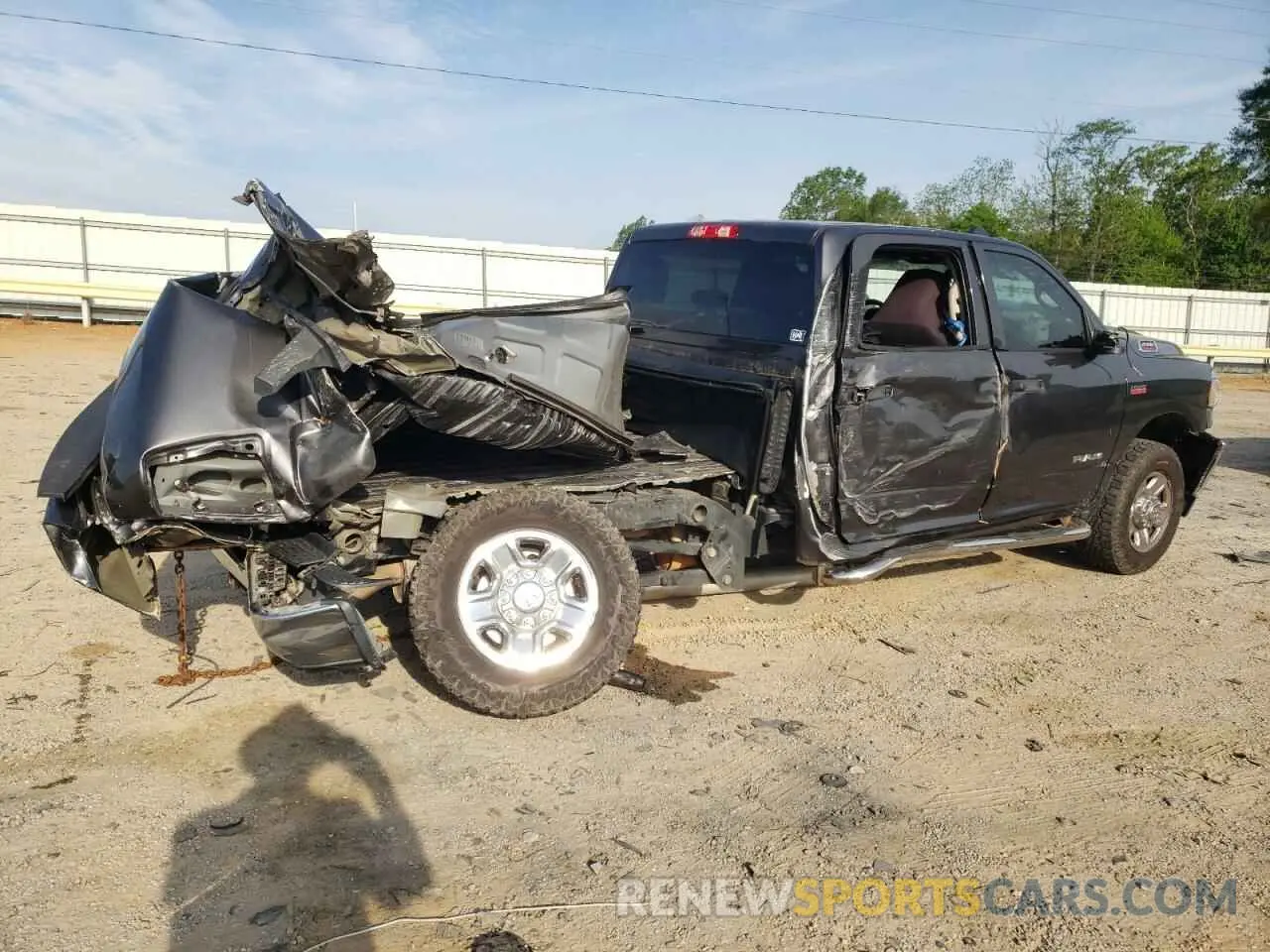 3 Photograph of a damaged car 3C6UR5CJXKG676955 RAM 2500 2019