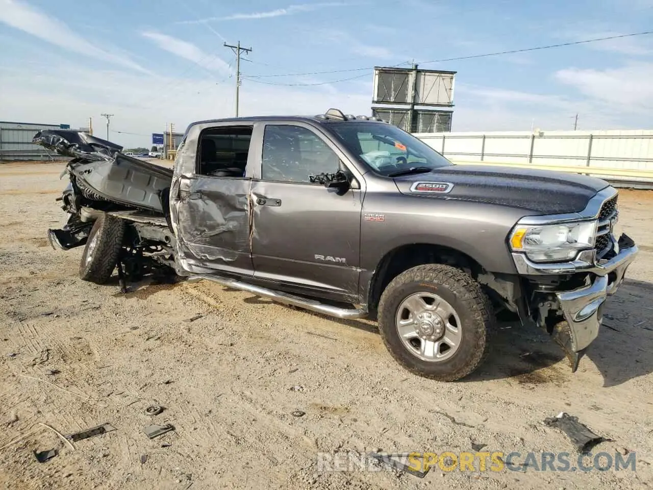 4 Photograph of a damaged car 3C6UR5CJXKG676955 RAM 2500 2019