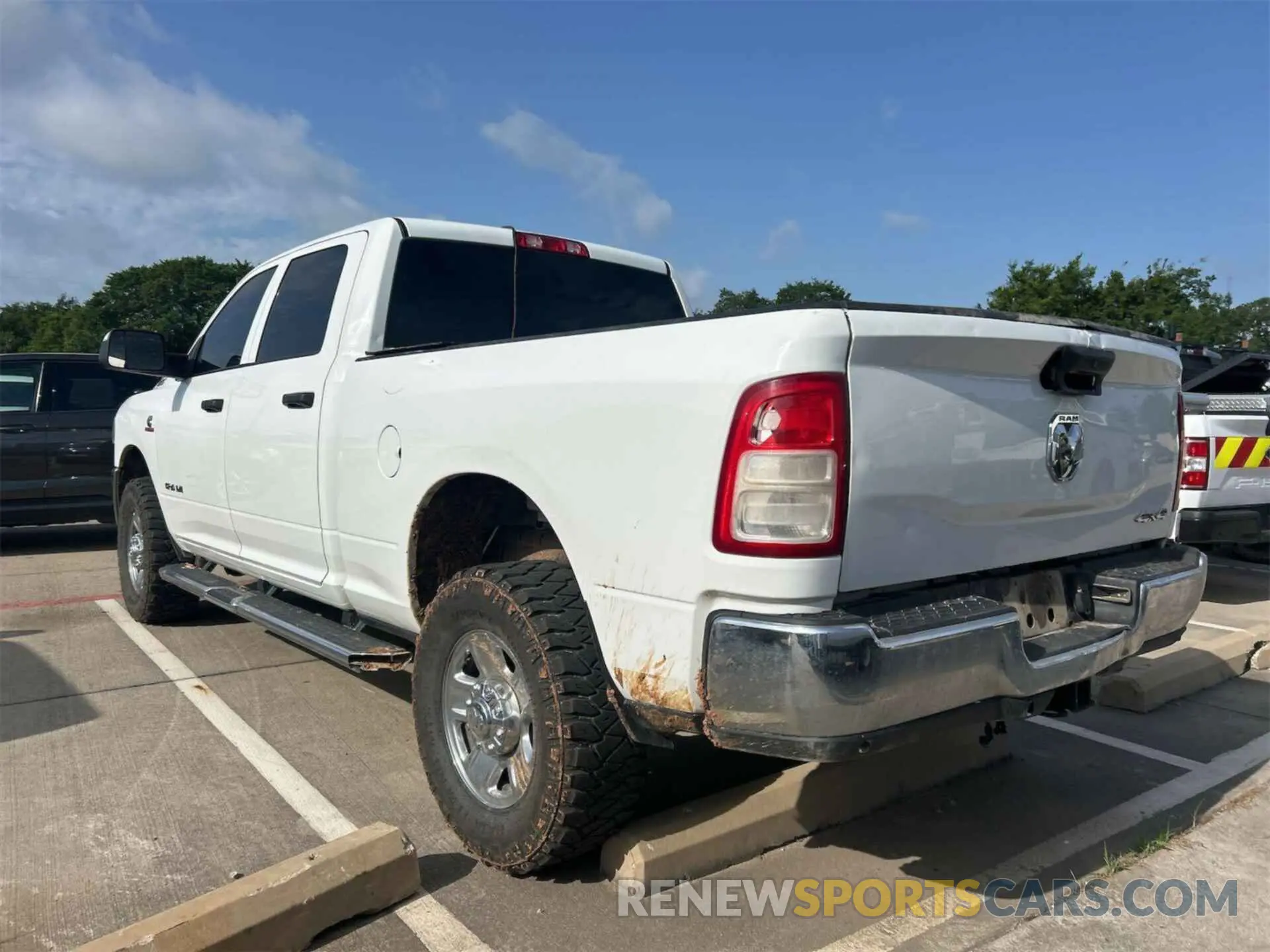 13 Photograph of a damaged car 3C6UR5CL1KG598096 RAM 2500 2019