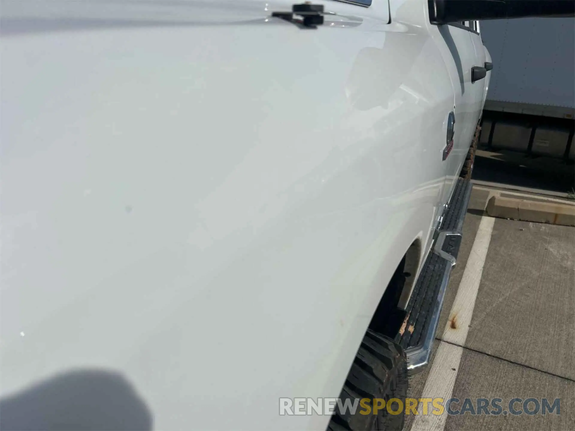 18 Photograph of a damaged car 3C6UR5CL1KG598096 RAM 2500 2019