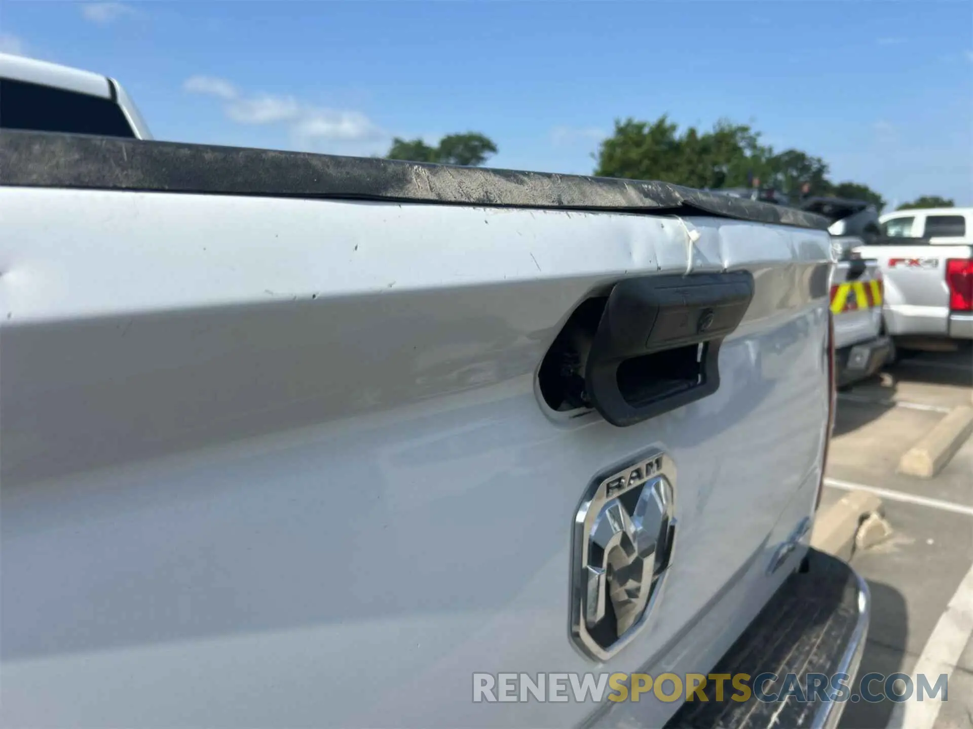 19 Photograph of a damaged car 3C6UR5CL1KG598096 RAM 2500 2019