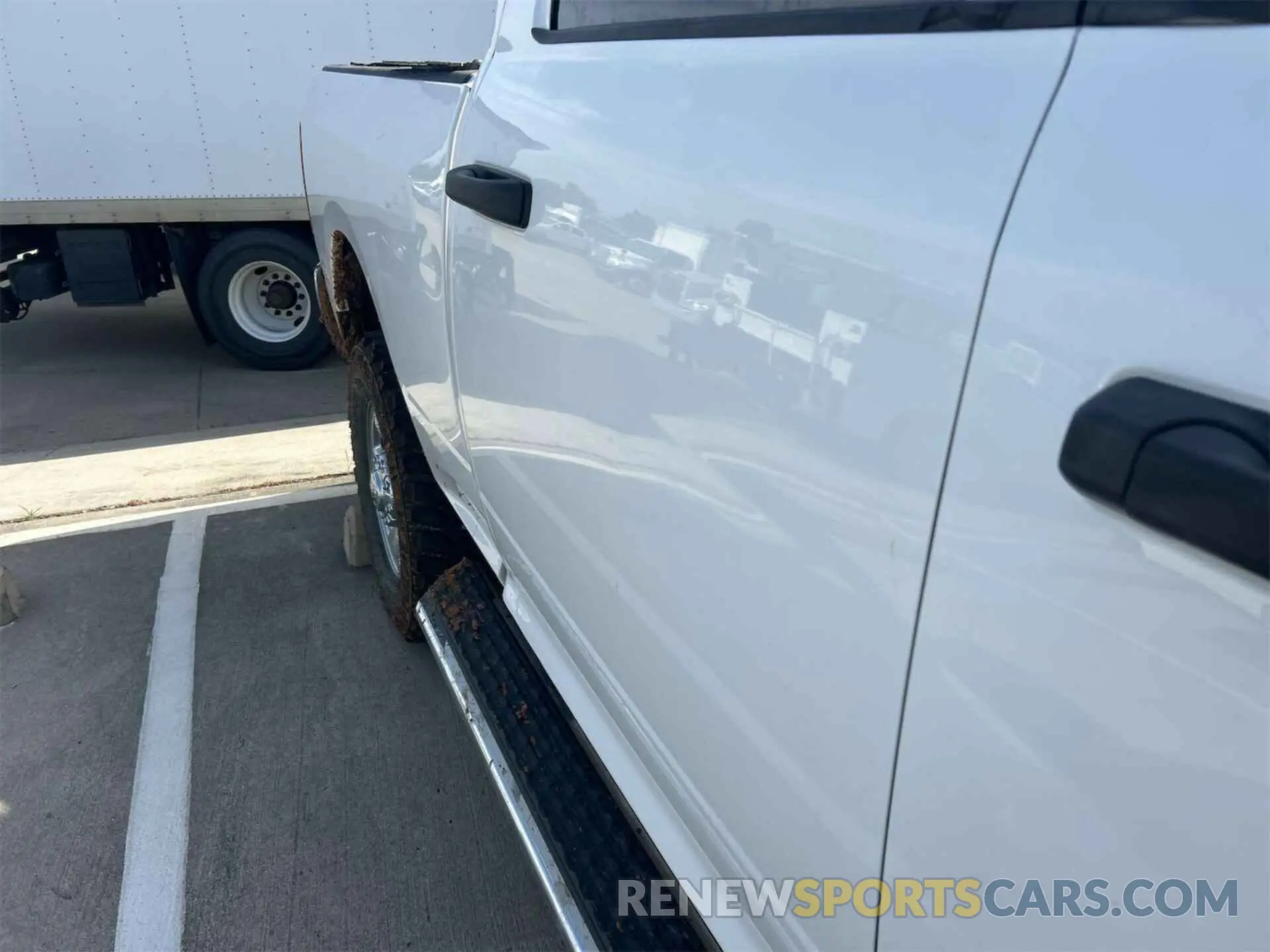 3 Photograph of a damaged car 3C6UR5CL1KG598096 RAM 2500 2019
