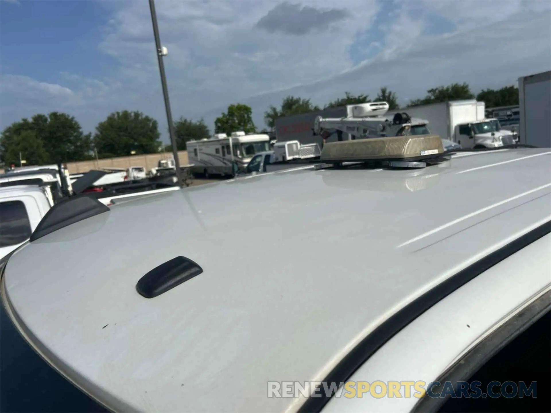 4 Photograph of a damaged car 3C6UR5CL1KG598096 RAM 2500 2019