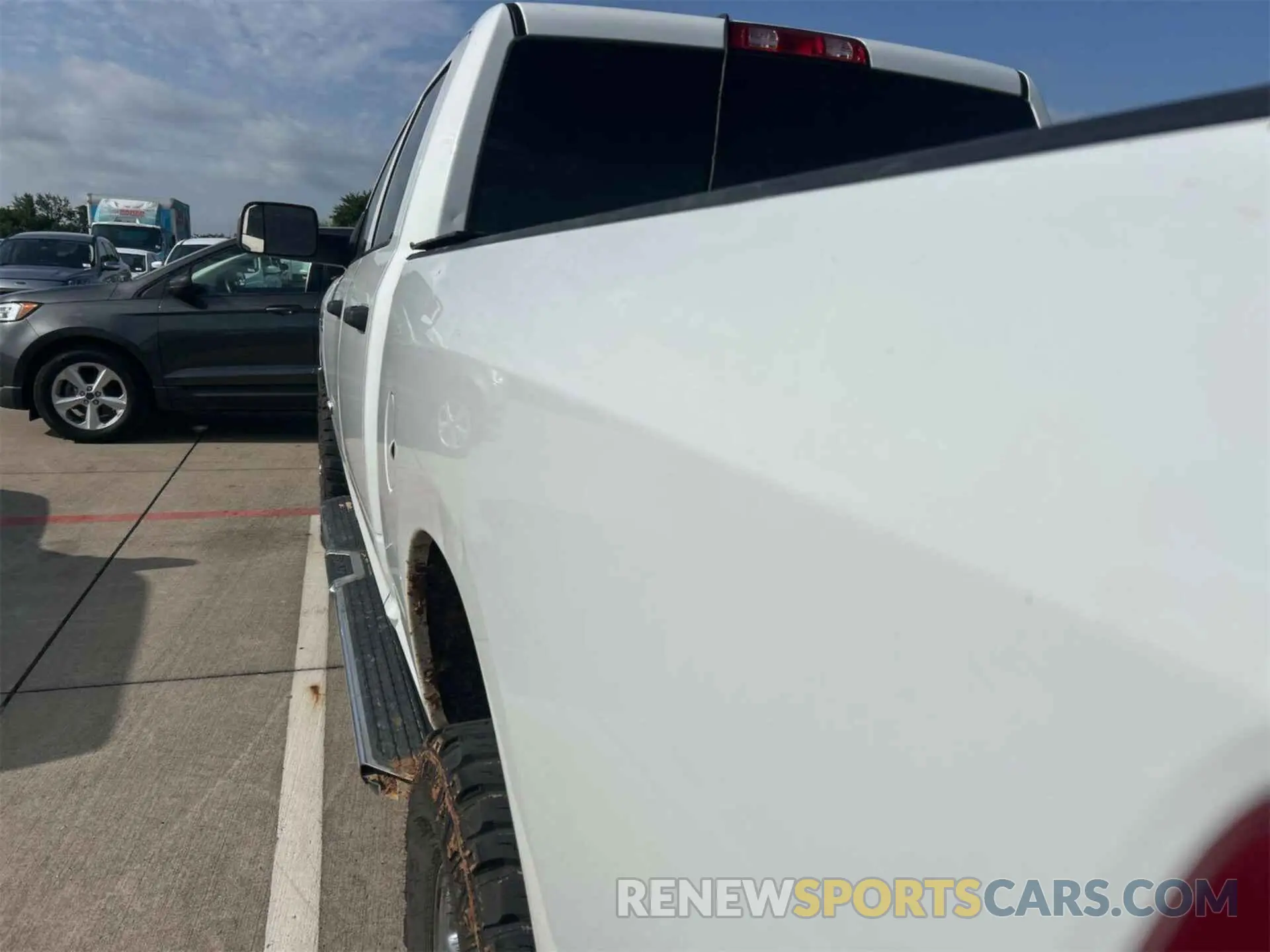 5 Photograph of a damaged car 3C6UR5CL1KG598096 RAM 2500 2019