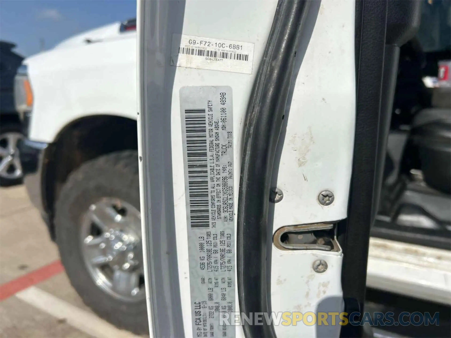 8 Photograph of a damaged car 3C6UR5CL1KG598096 RAM 2500 2019