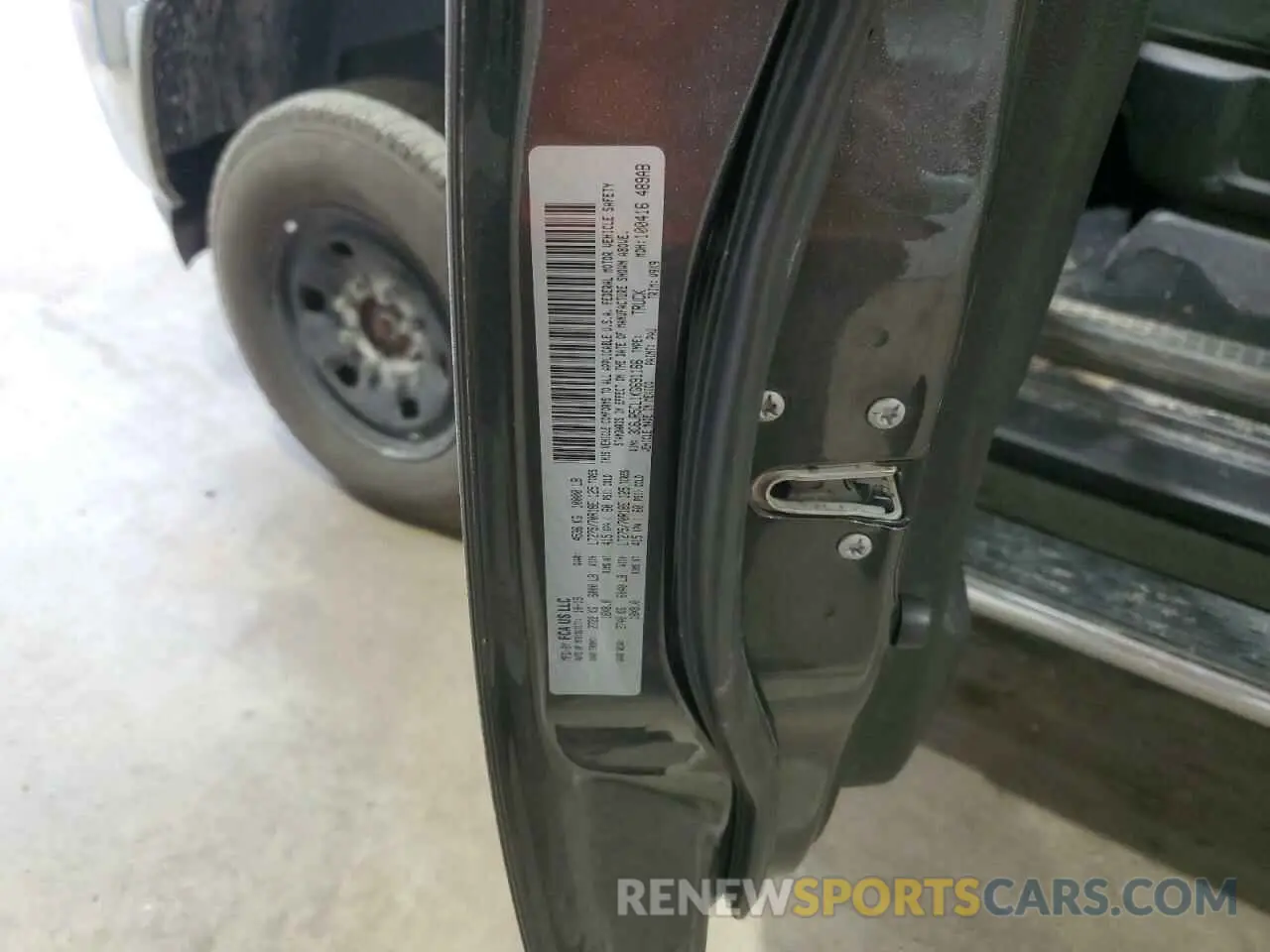 12 Photograph of a damaged car 3C6UR5CL1KG691166 RAM 2500 2019