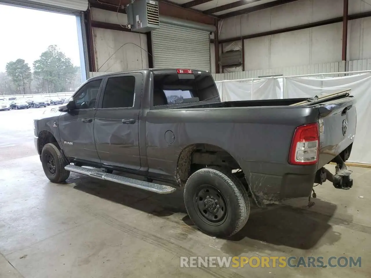 2 Photograph of a damaged car 3C6UR5CL1KG691166 RAM 2500 2019