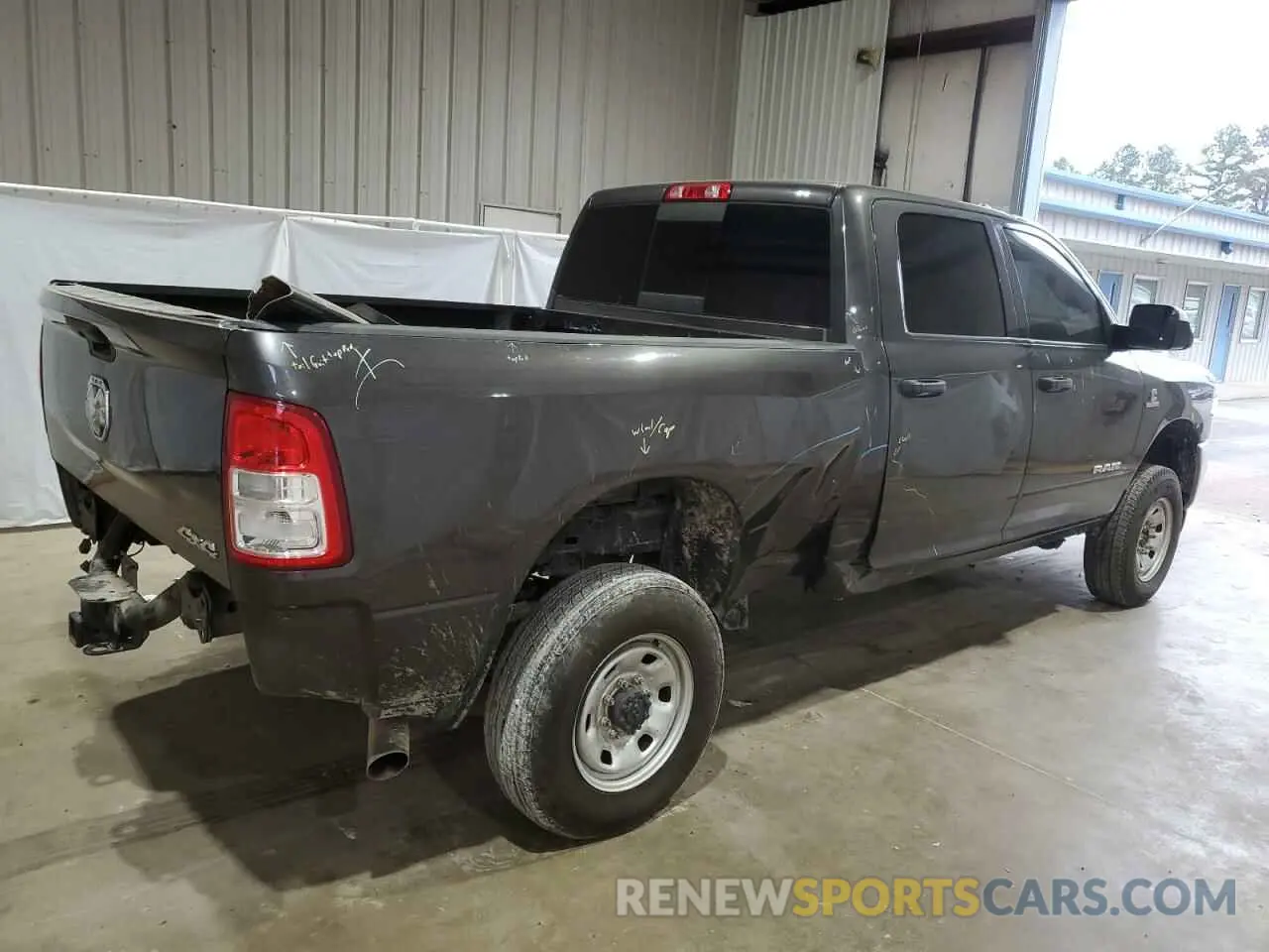 3 Photograph of a damaged car 3C6UR5CL1KG691166 RAM 2500 2019