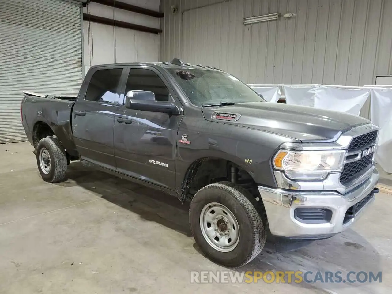 4 Photograph of a damaged car 3C6UR5CL1KG691166 RAM 2500 2019