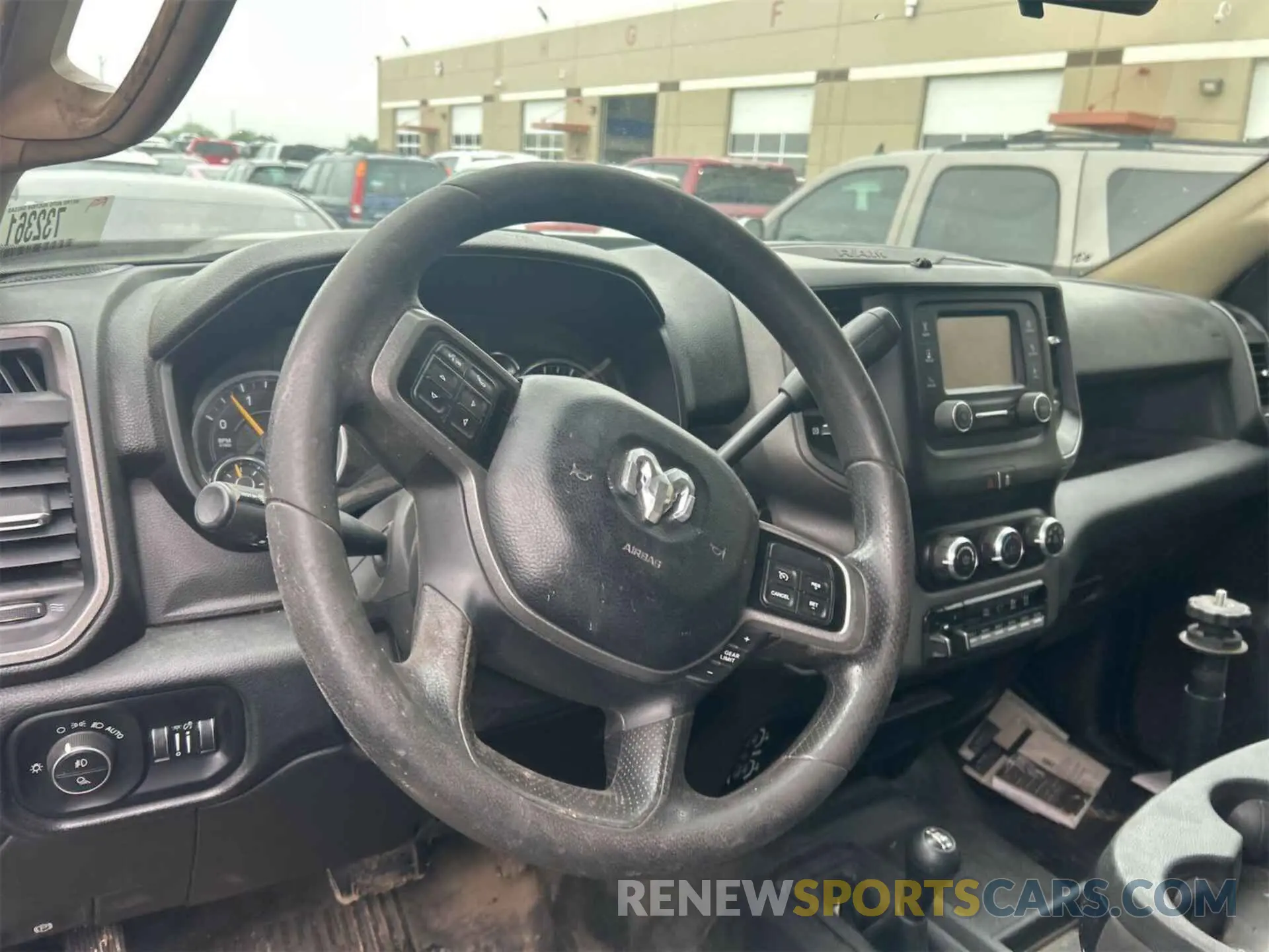 18 Photograph of a damaged car 3C6UR5CL4KG598108 RAM 2500 2019