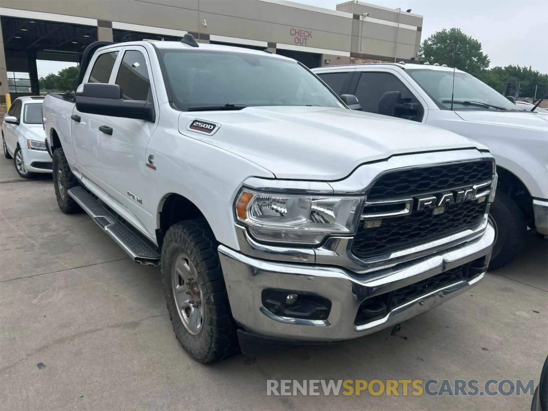 21 Photograph of a damaged car 3C6UR5CL4KG598108 RAM 2500 2019
