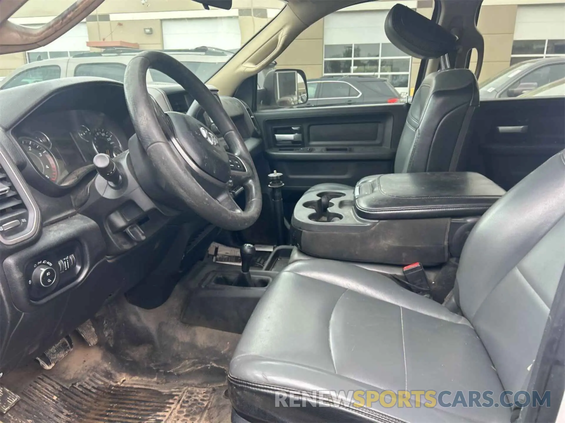 23 Photograph of a damaged car 3C6UR5CL4KG598108 RAM 2500 2019