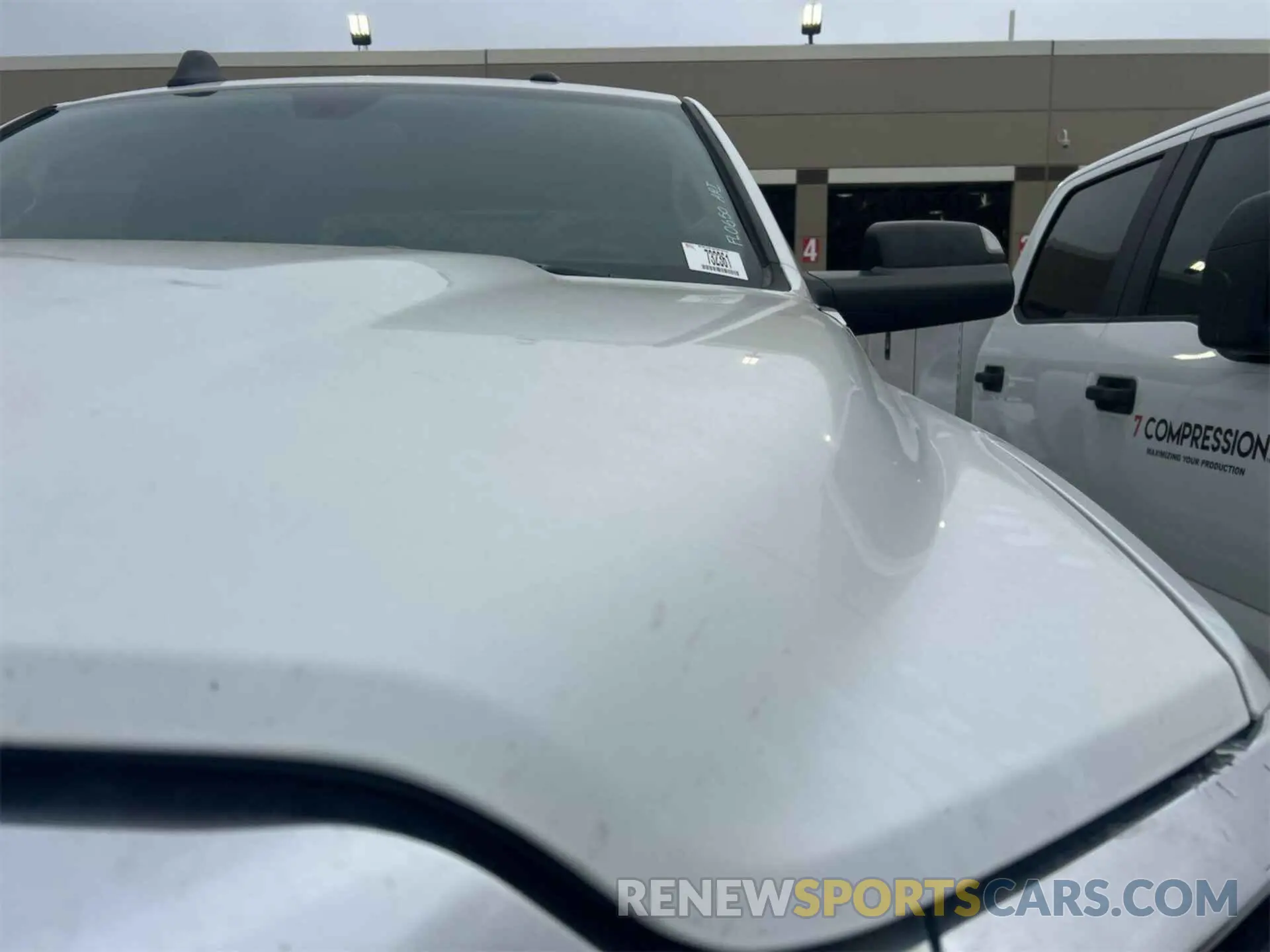 6 Photograph of a damaged car 3C6UR5CL4KG598108 RAM 2500 2019