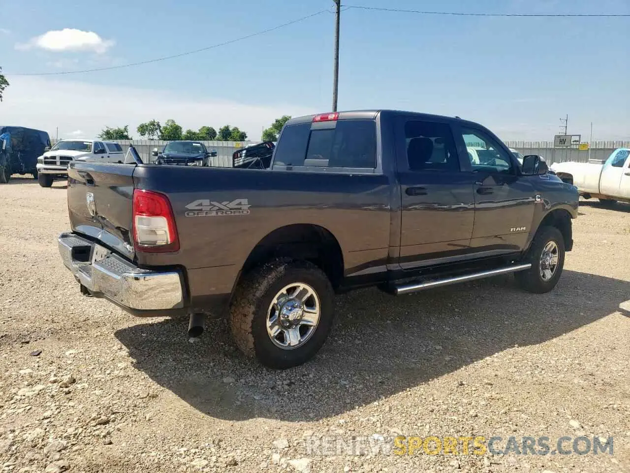 3 Photograph of a damaged car 3C6UR5CL4KG619510 RAM 2500 2019