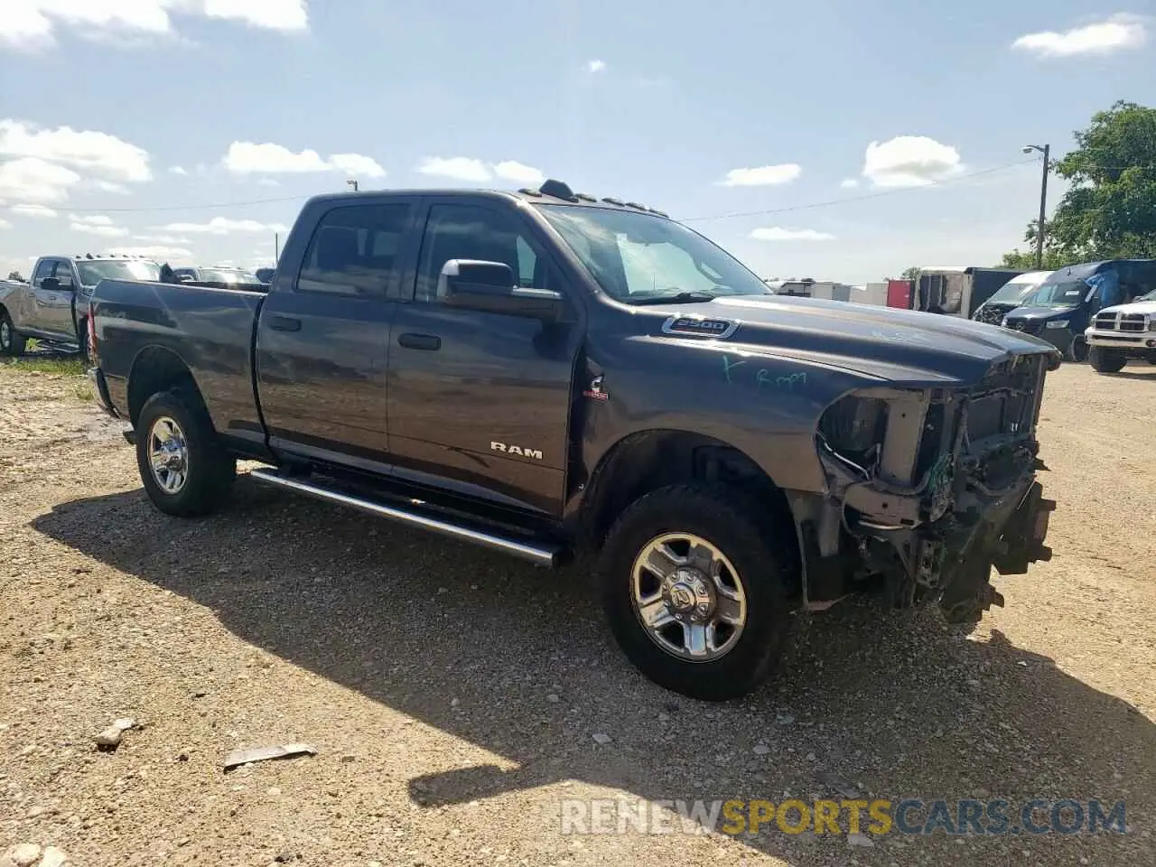 4 Photograph of a damaged car 3C6UR5CL4KG619510 RAM 2500 2019