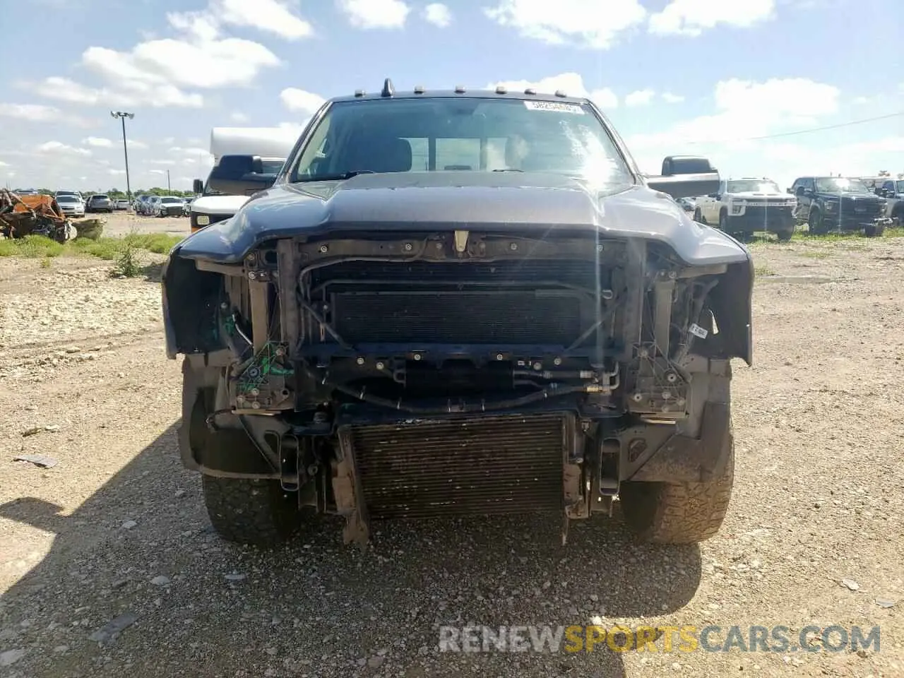 5 Photograph of a damaged car 3C6UR5CL4KG619510 RAM 2500 2019