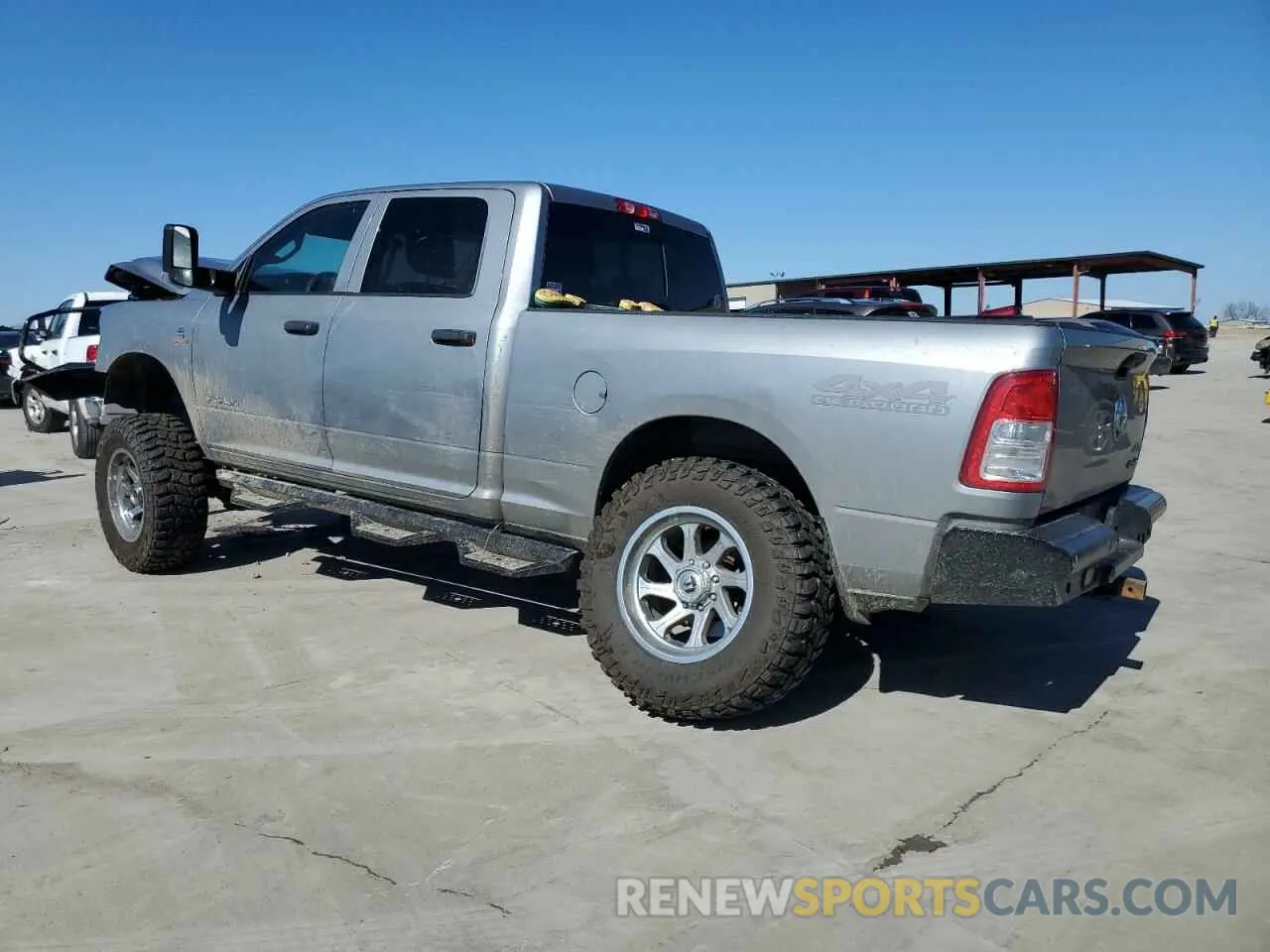 2 Photograph of a damaged car 3C6UR5CL5KG705523 RAM 2500 2019