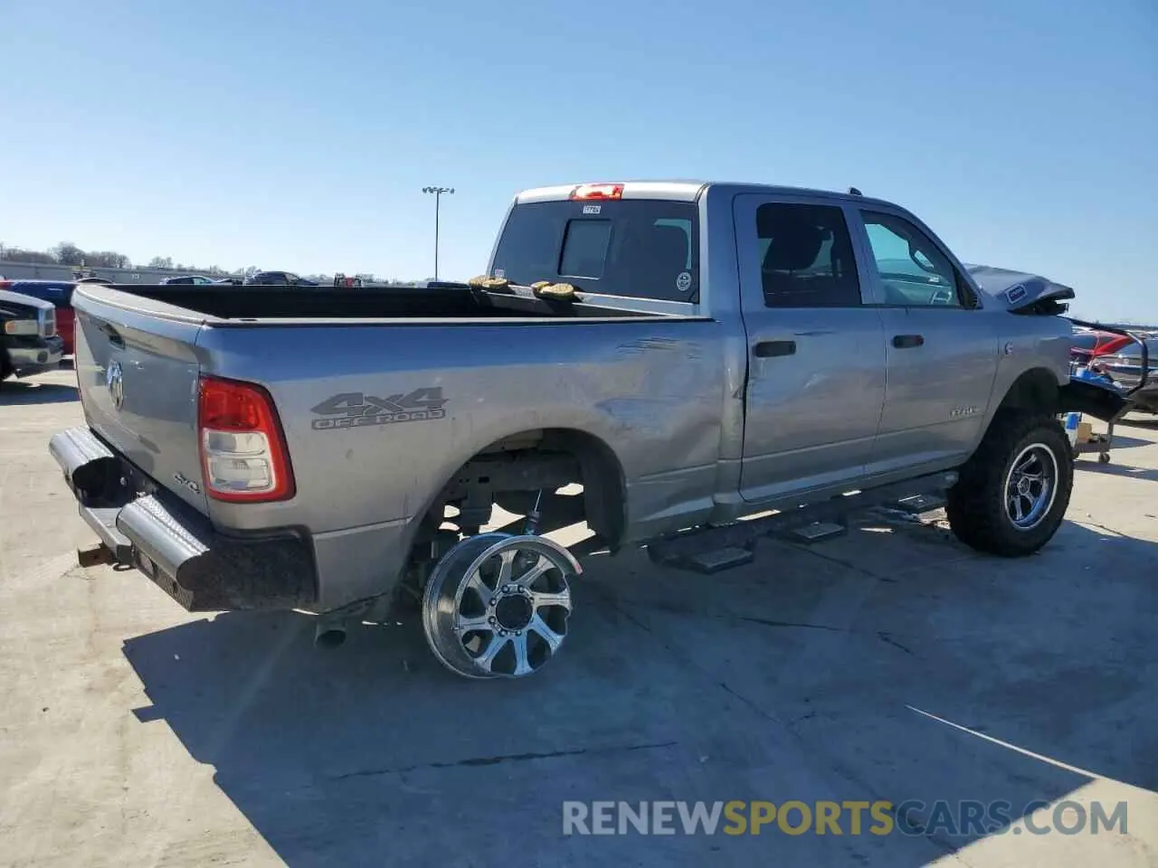 3 Photograph of a damaged car 3C6UR5CL5KG705523 RAM 2500 2019