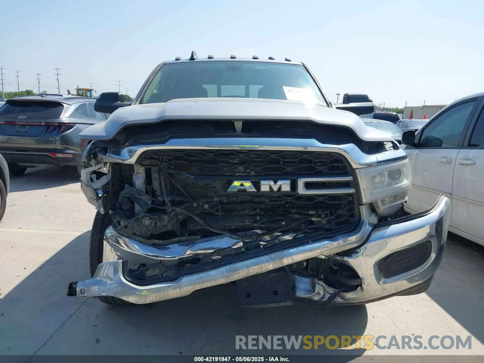 12 Photograph of a damaged car 3C6UR5CL6KG579561 RAM 2500 2019