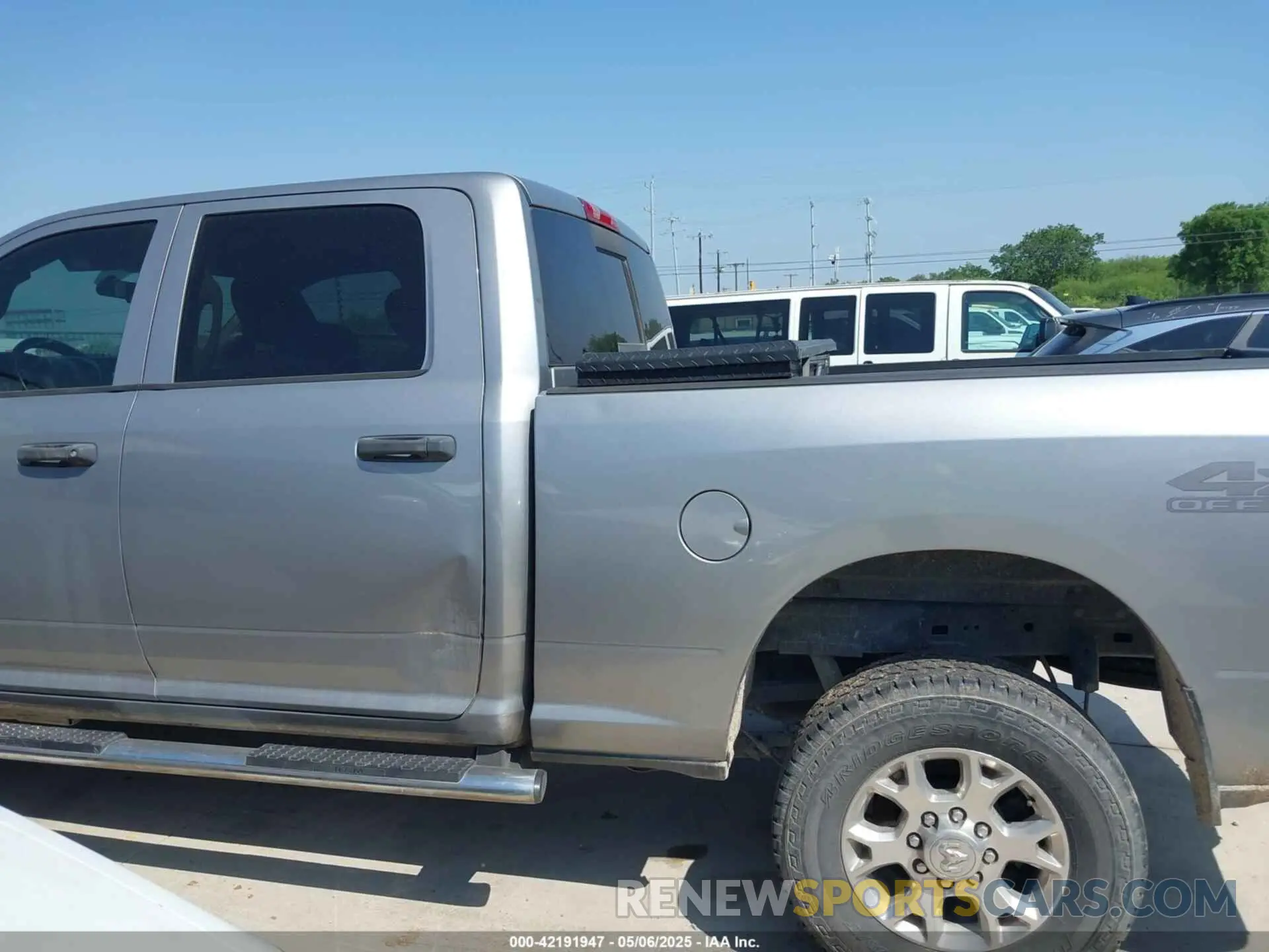 14 Photograph of a damaged car 3C6UR5CL6KG579561 RAM 2500 2019