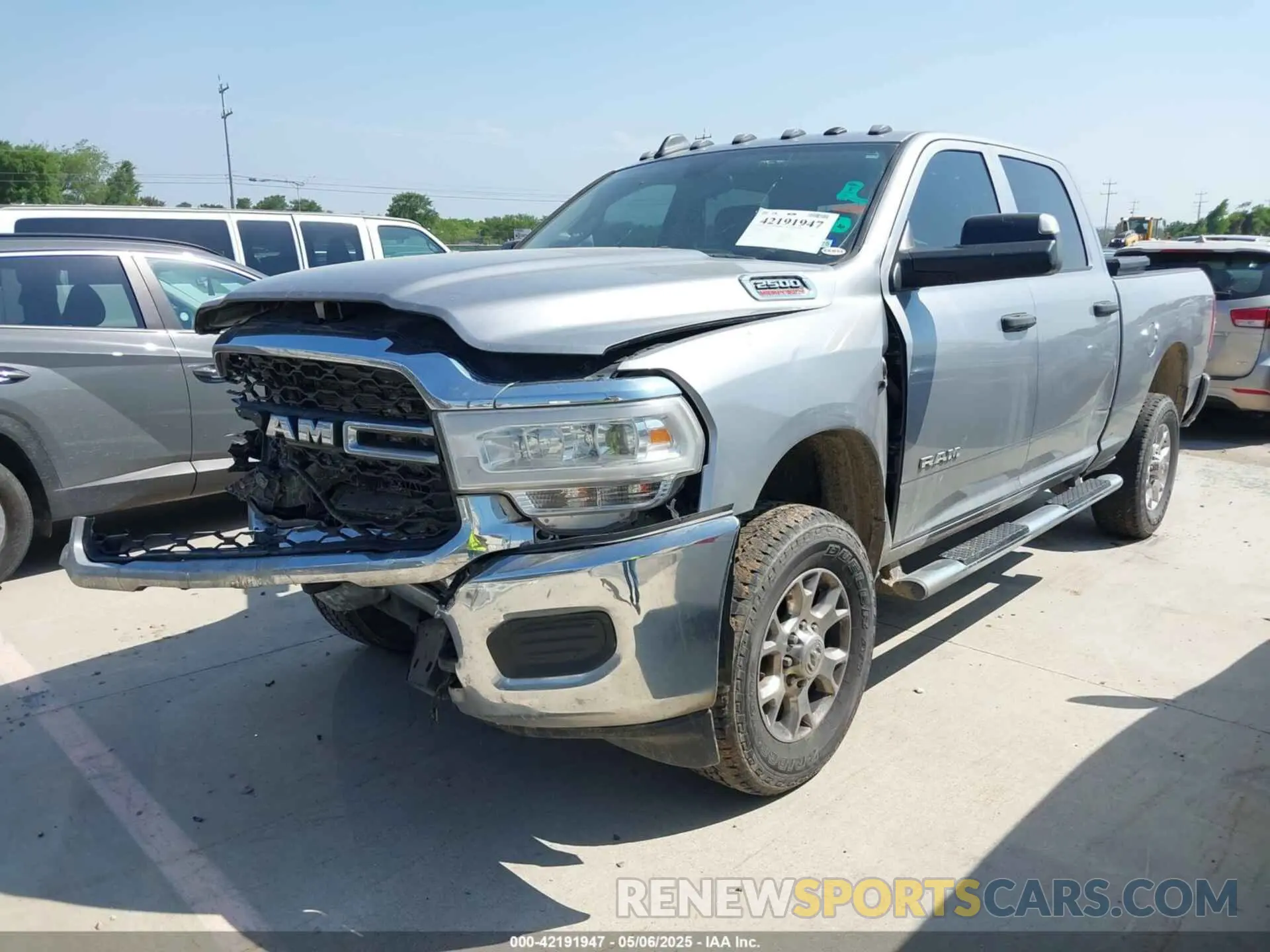 2 Photograph of a damaged car 3C6UR5CL6KG579561 RAM 2500 2019
