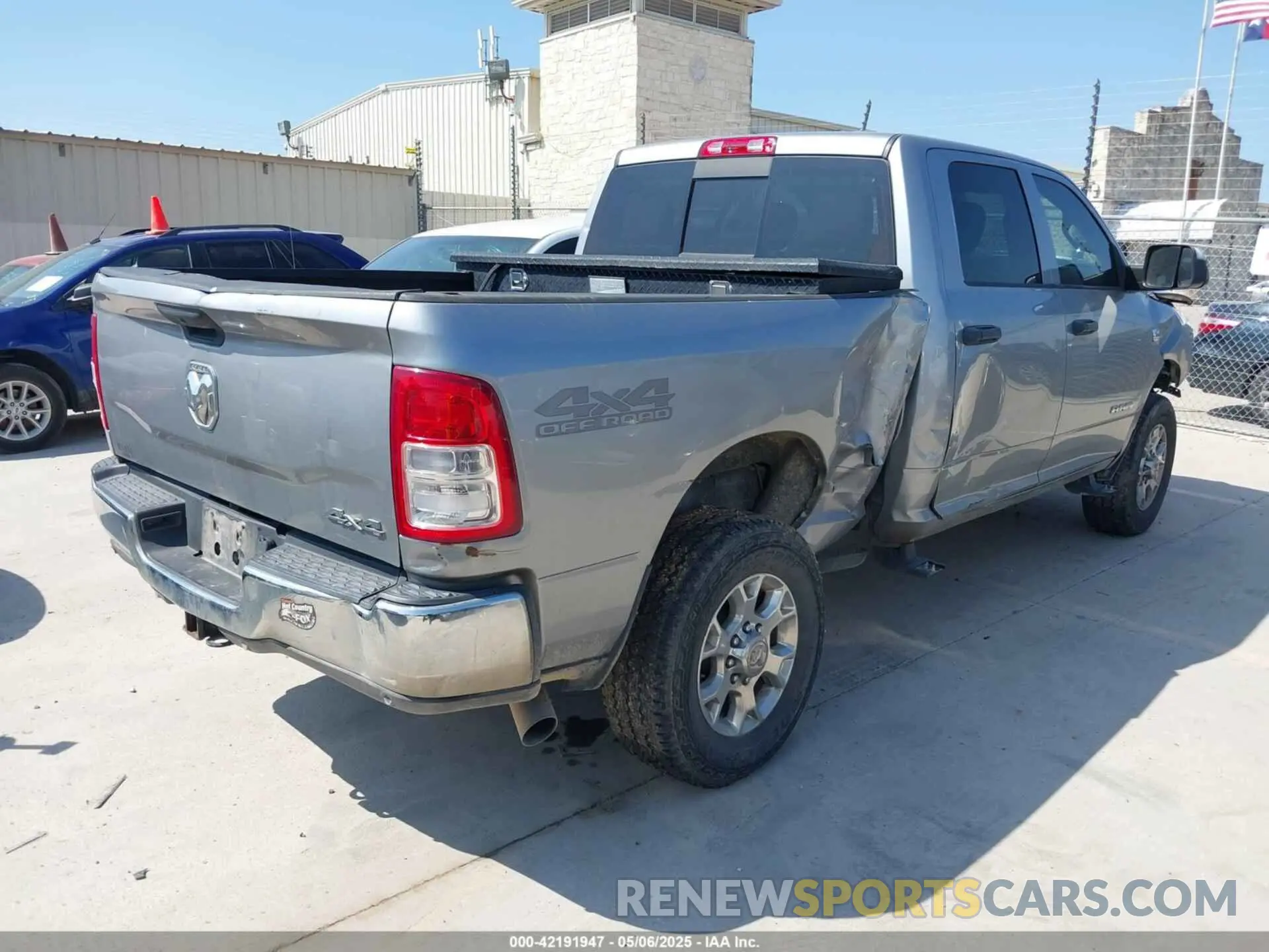 4 Photograph of a damaged car 3C6UR5CL6KG579561 RAM 2500 2019