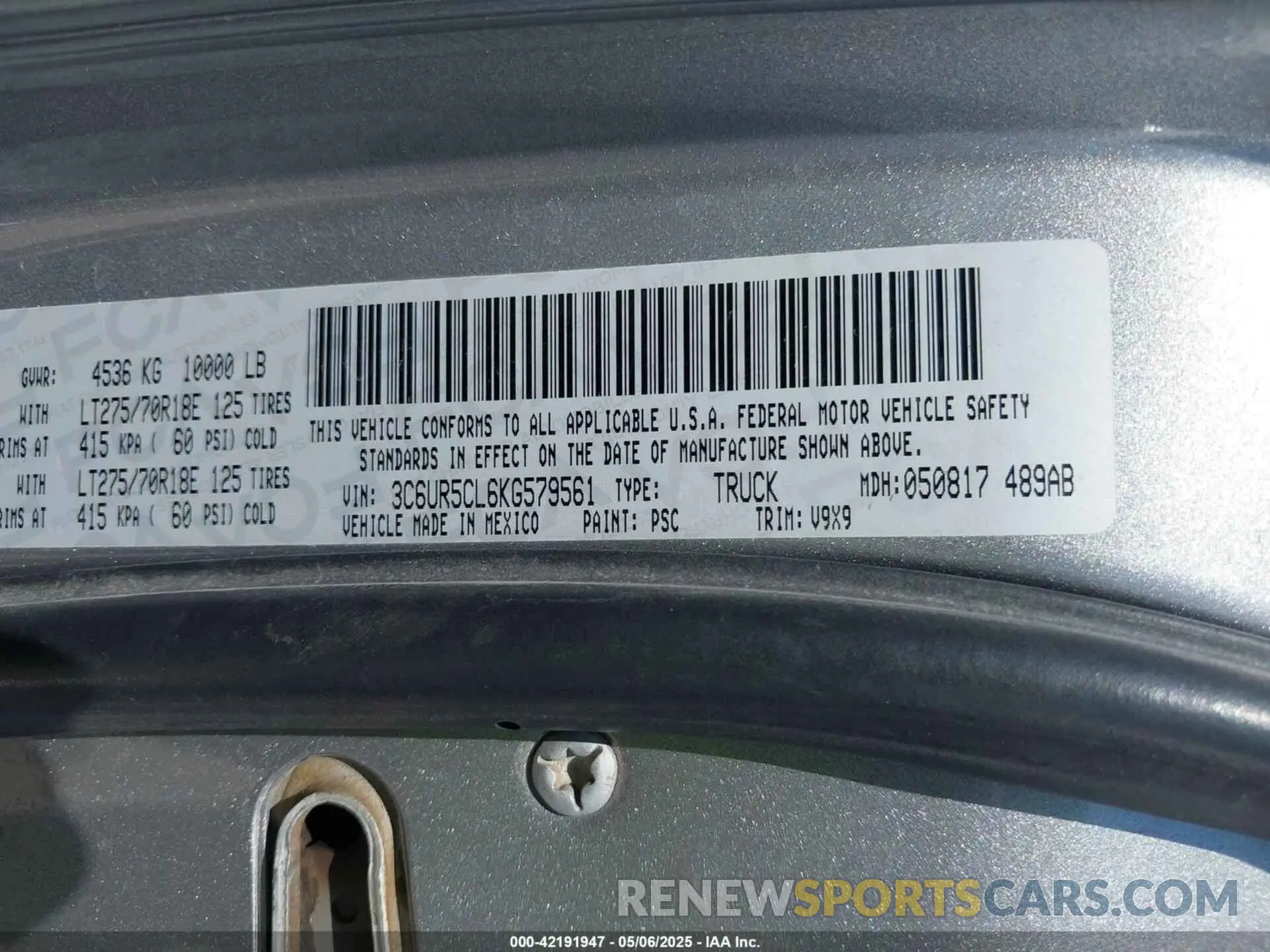 9 Photograph of a damaged car 3C6UR5CL6KG579561 RAM 2500 2019