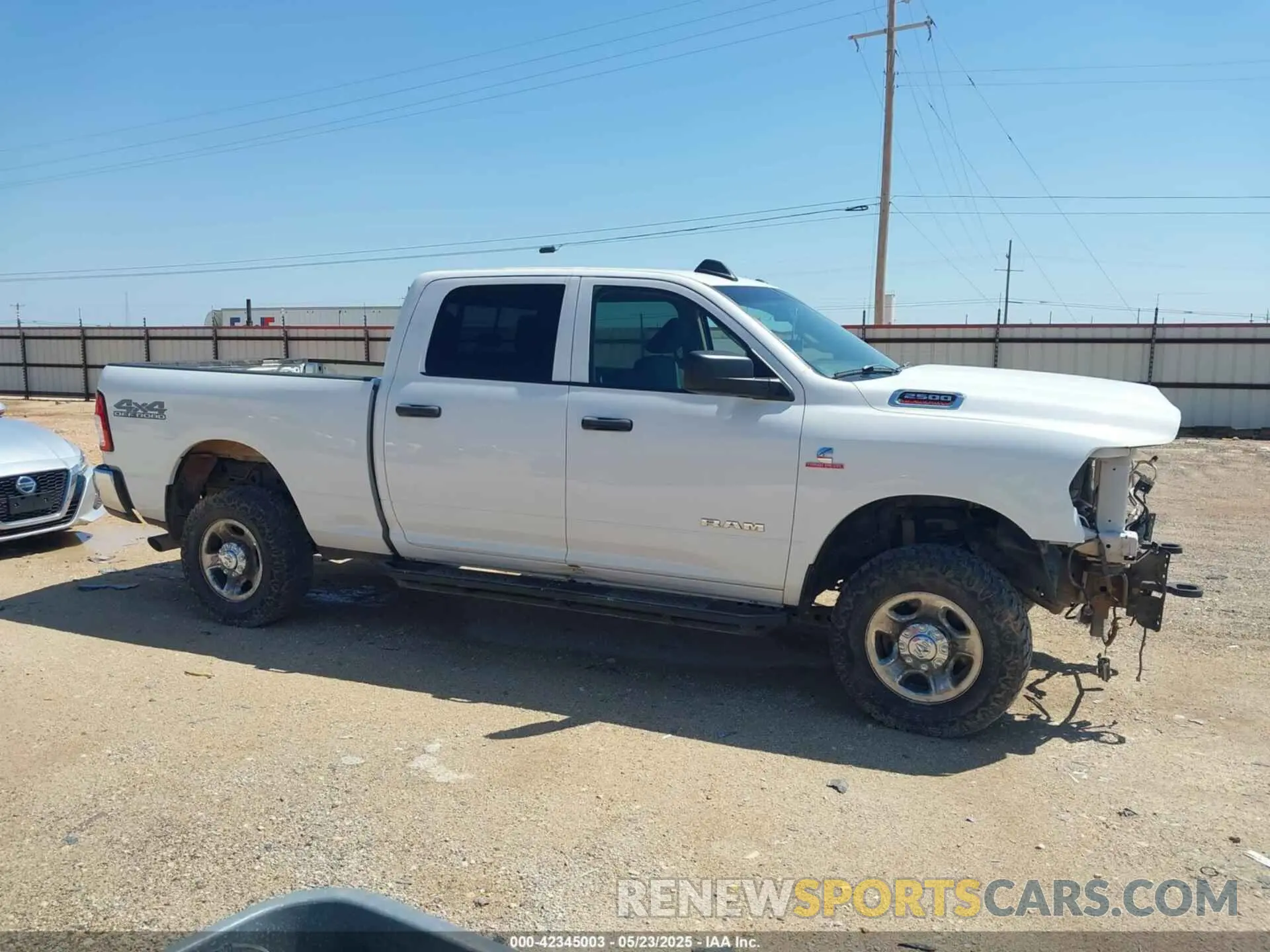 13 Photograph of a damaged car 3C6UR5CL6KG621369 RAM 2500 2019