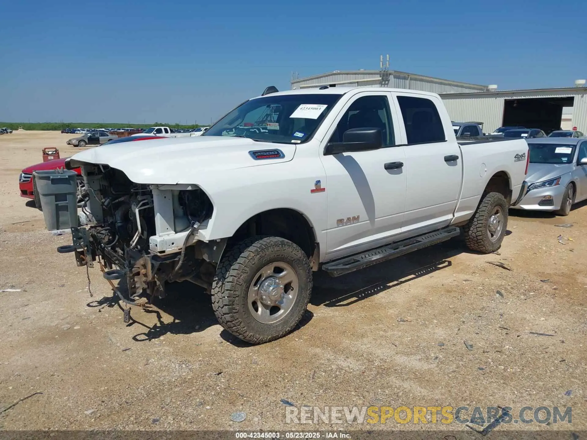 2 Photograph of a damaged car 3C6UR5CL6KG621369 RAM 2500 2019