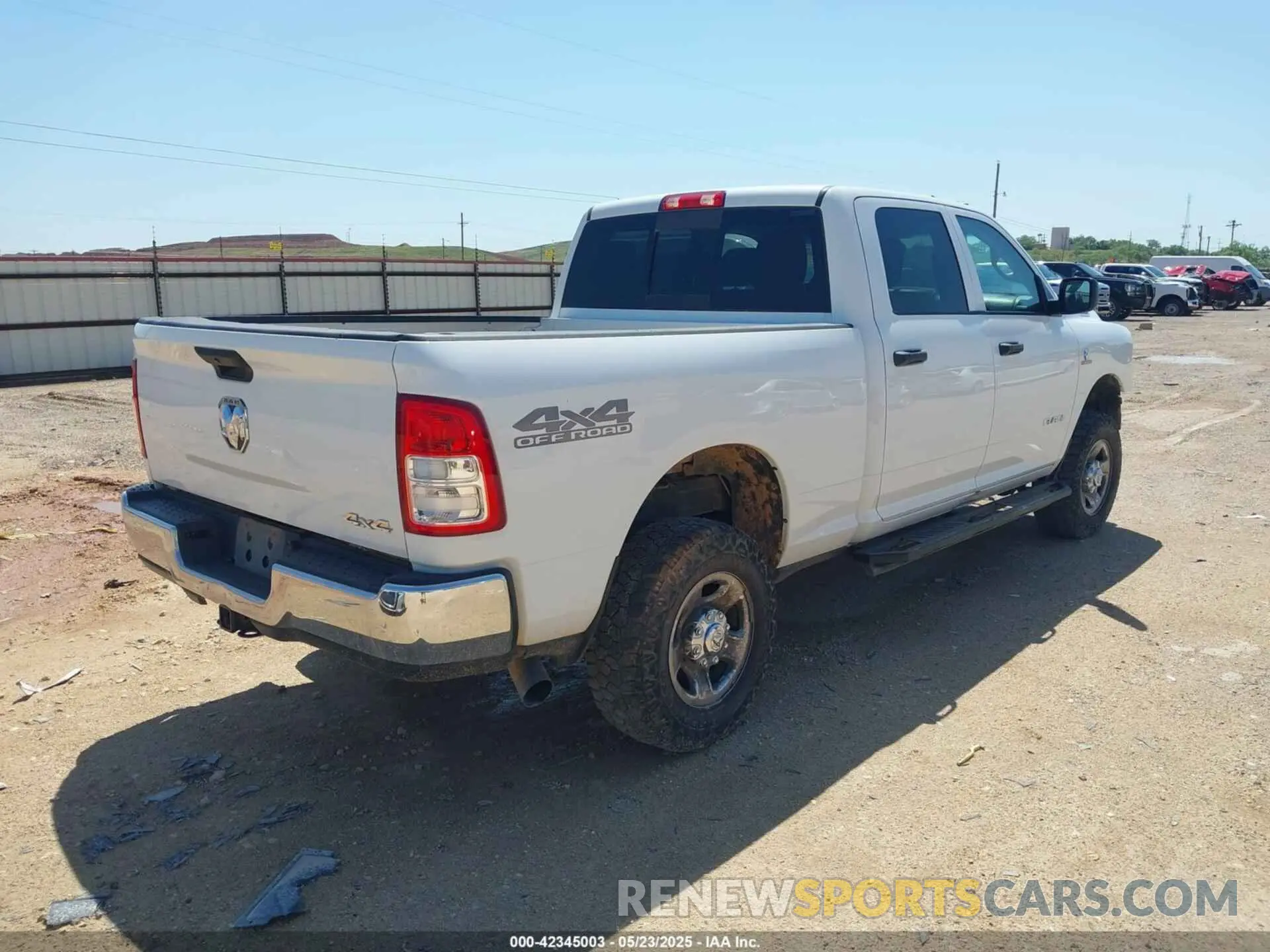 4 Photograph of a damaged car 3C6UR5CL6KG621369 RAM 2500 2019
