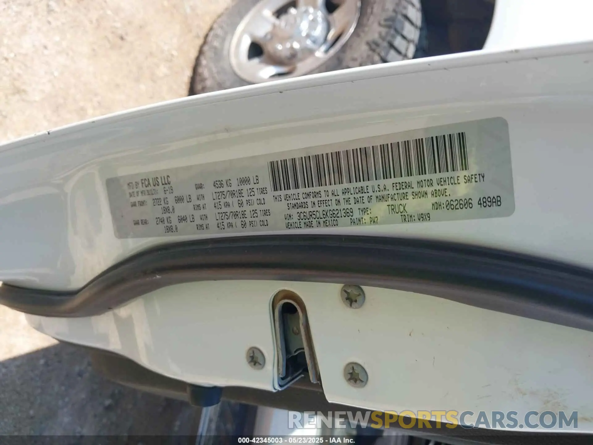 9 Photograph of a damaged car 3C6UR5CL6KG621369 RAM 2500 2019