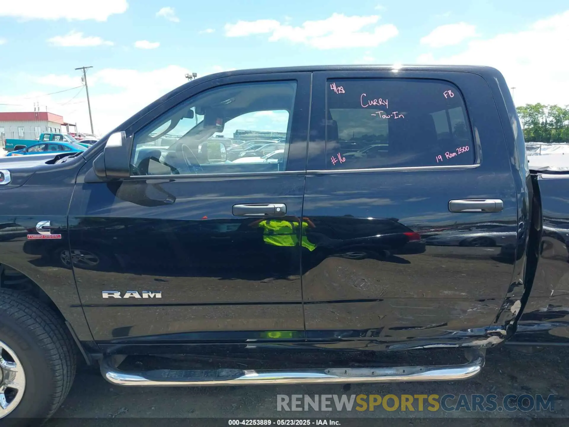 14 Photograph of a damaged car 3C6UR5CL7KG552062 RAM 2500 2019