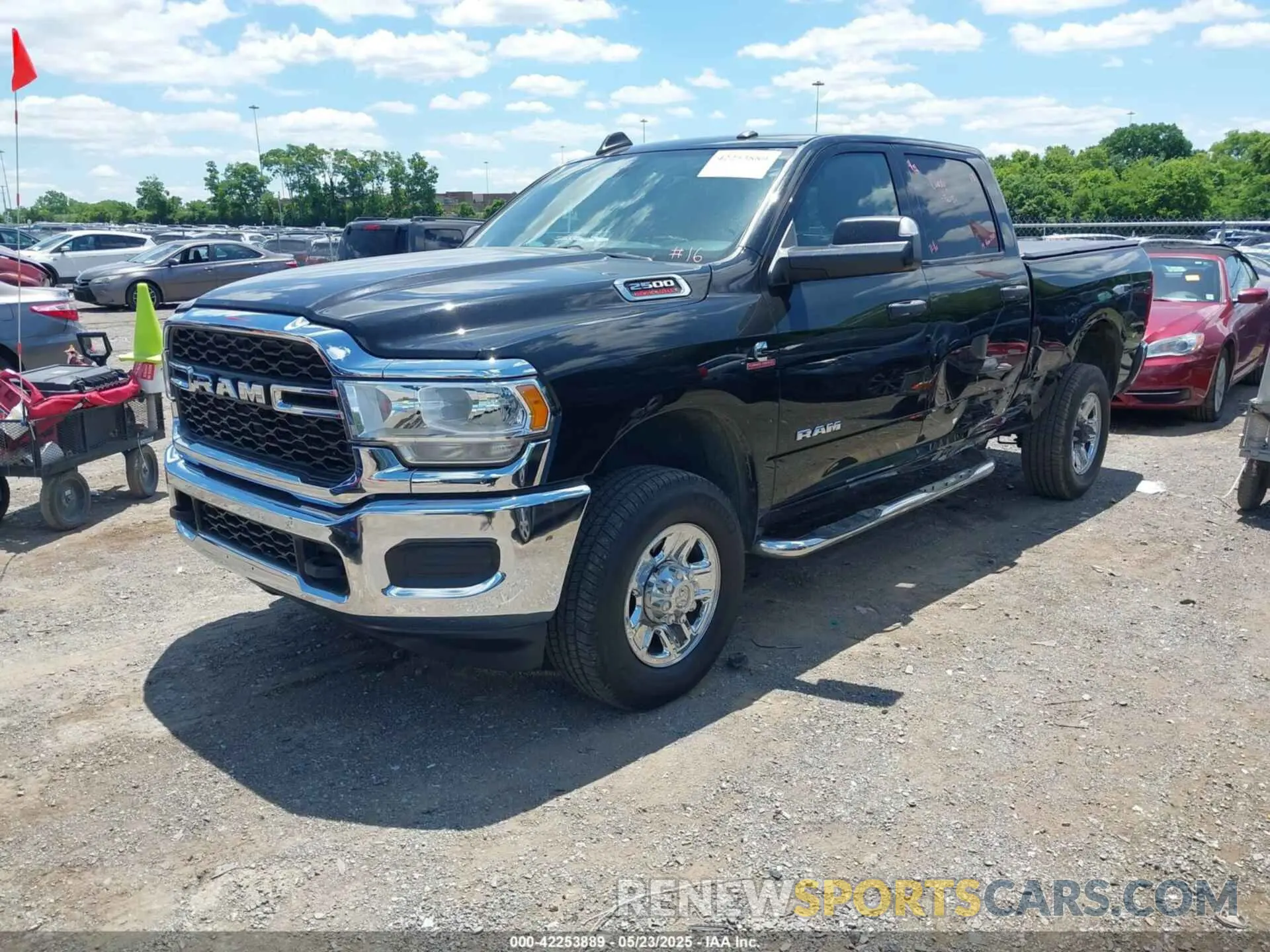 2 Photograph of a damaged car 3C6UR5CL7KG552062 RAM 2500 2019