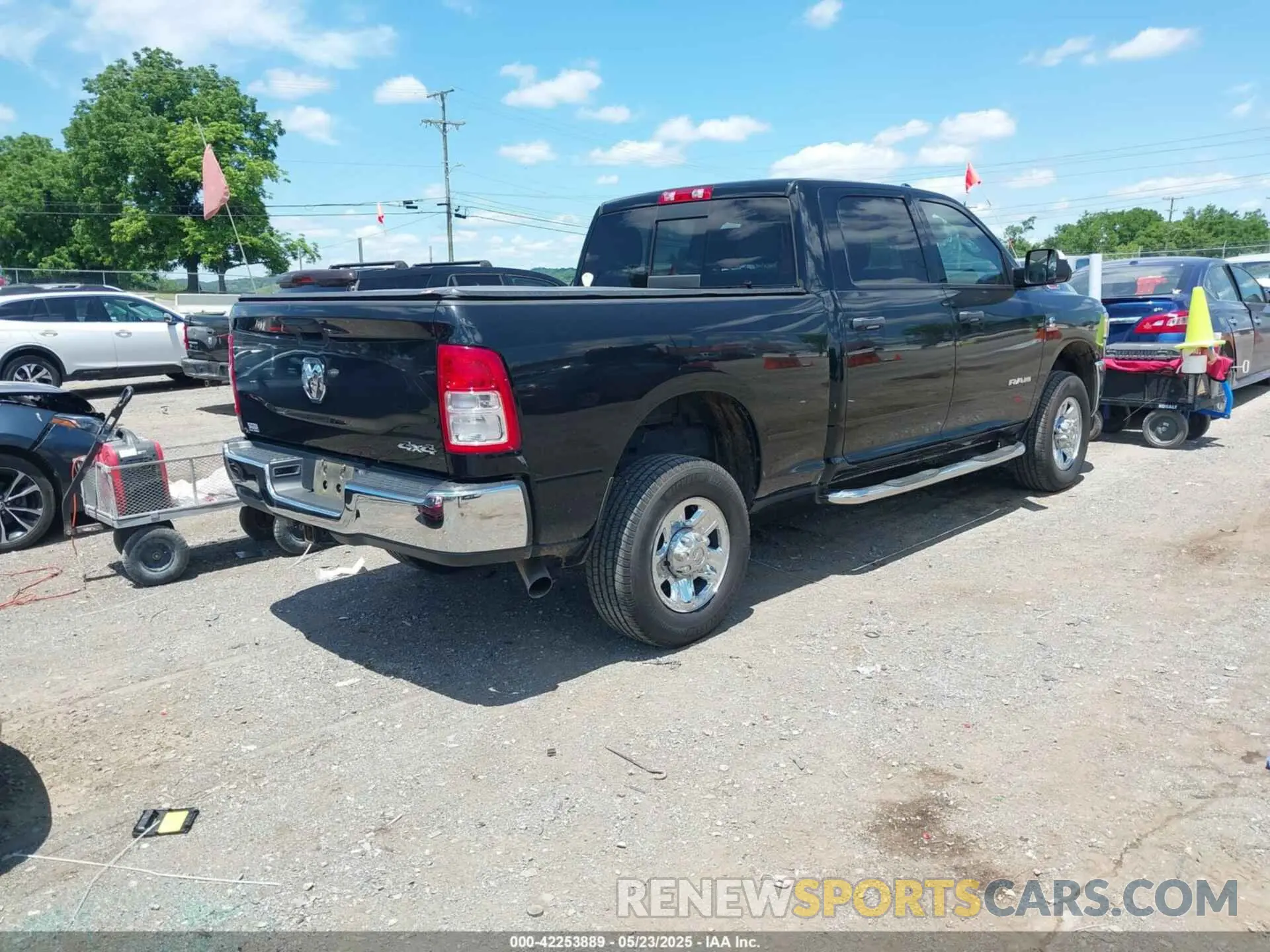 4 Photograph of a damaged car 3C6UR5CL7KG552062 RAM 2500 2019