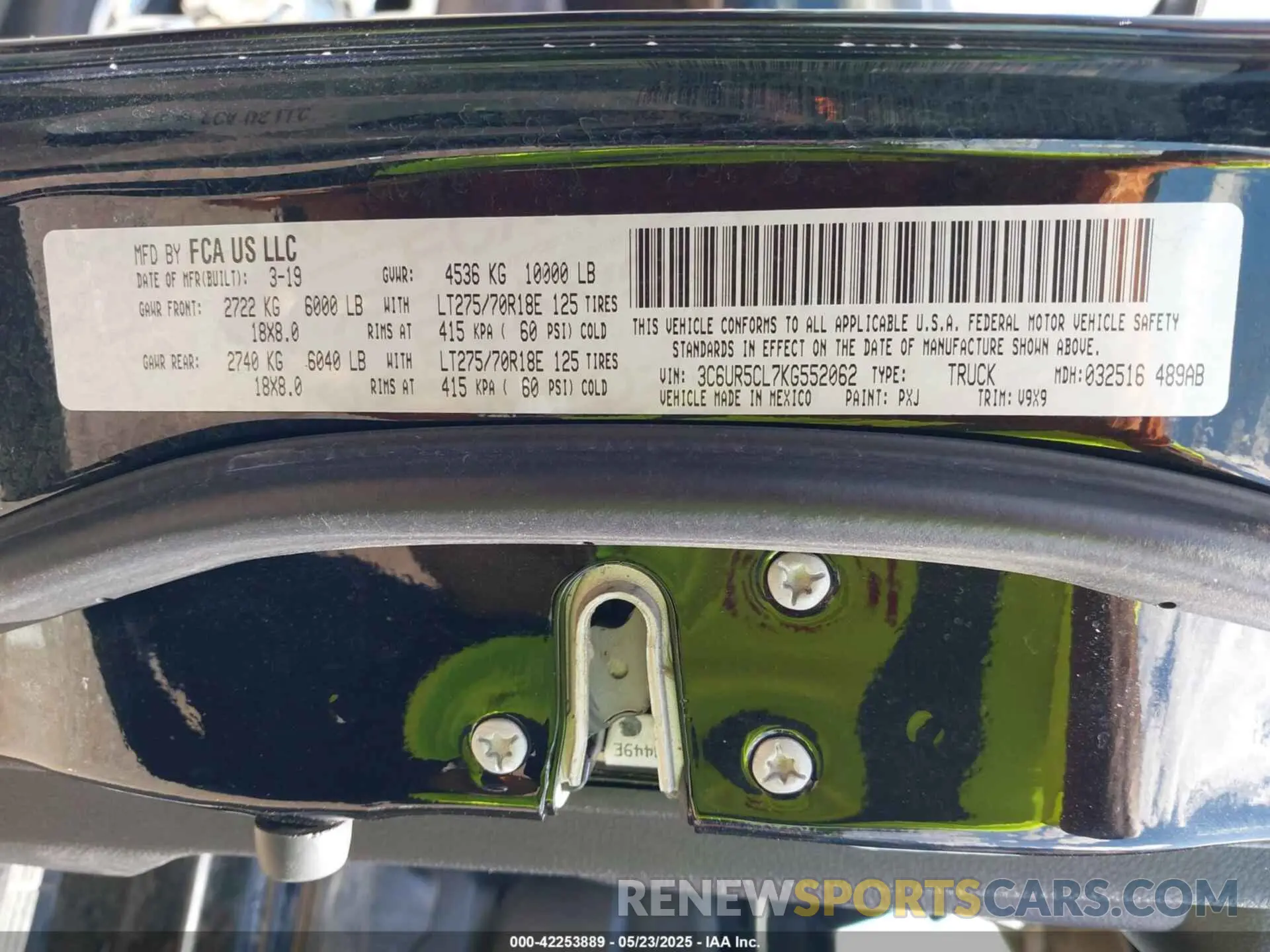 9 Photograph of a damaged car 3C6UR5CL7KG552062 RAM 2500 2019