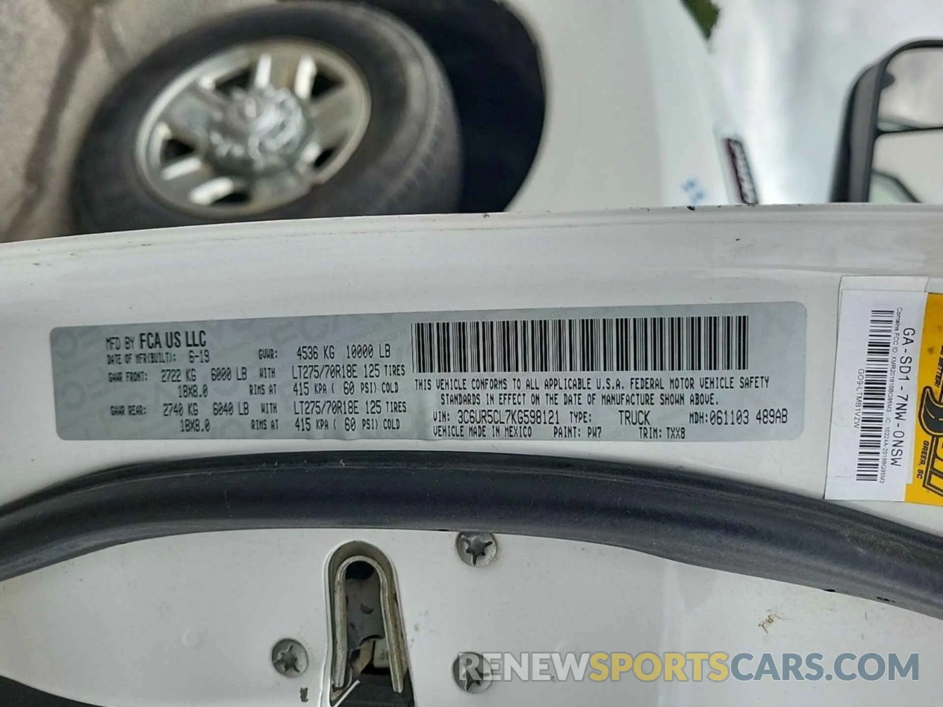 22 Photograph of a damaged car 3C6UR5CL7KG598121 RAM 2500 2019