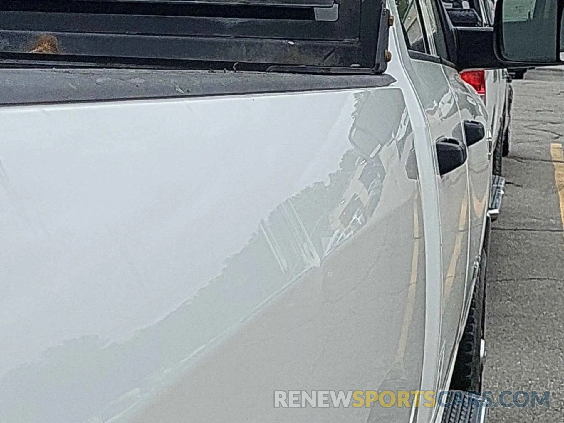 23 Photograph of a damaged car 3C6UR5CL7KG598121 RAM 2500 2019