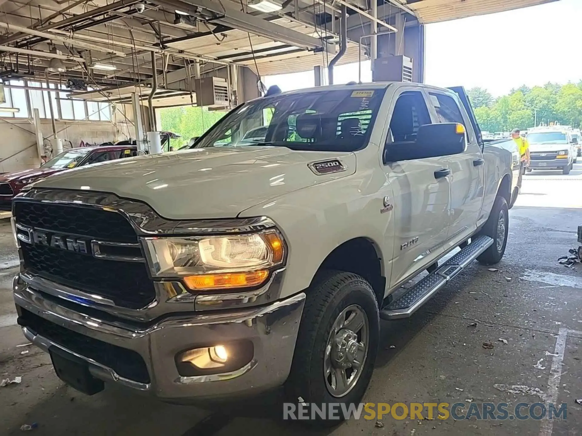 3 Photograph of a damaged car 3C6UR5CL7KG598121 RAM 2500 2019