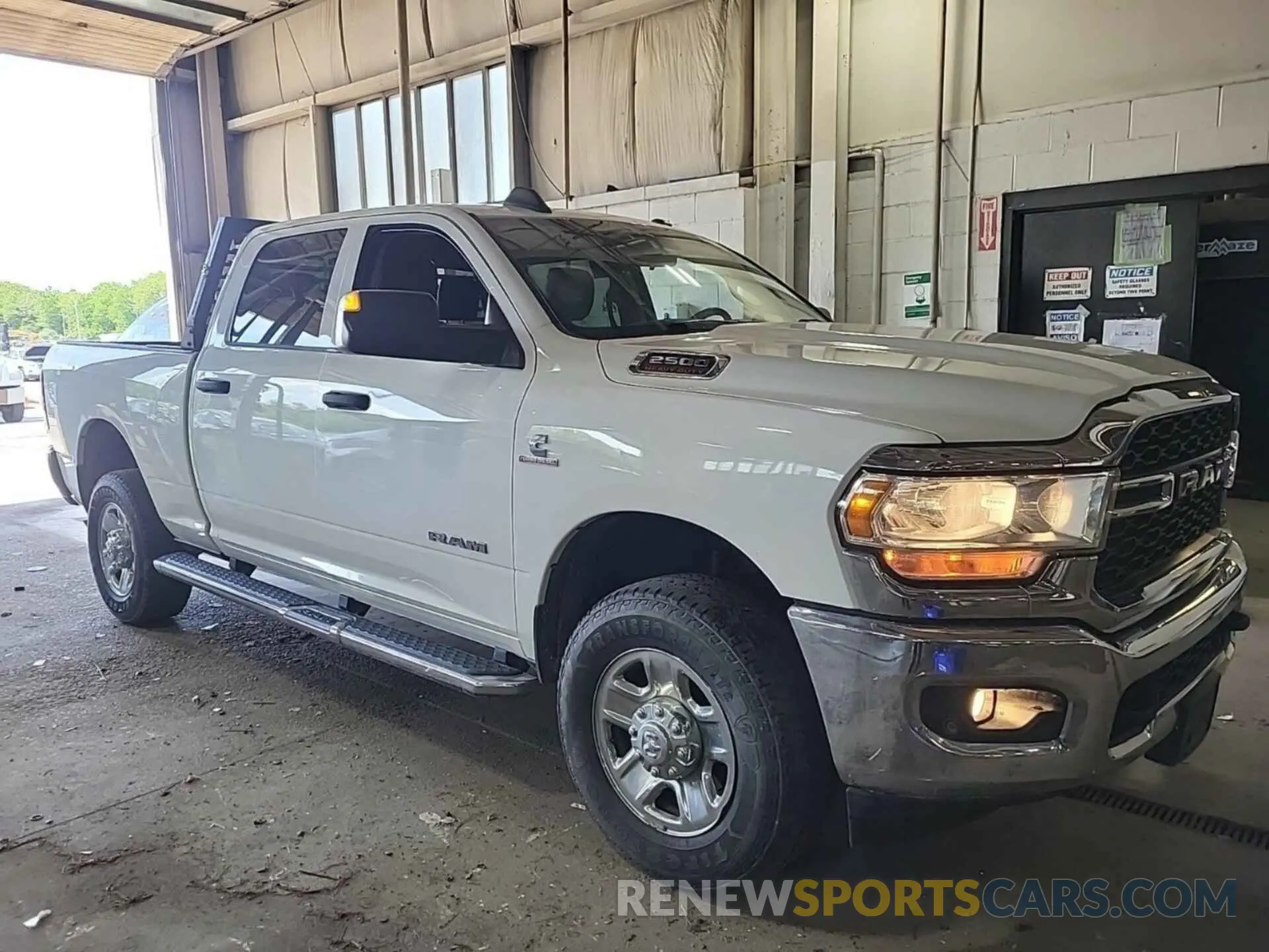 37 Photograph of a damaged car 3C6UR5CL7KG598121 RAM 2500 2019