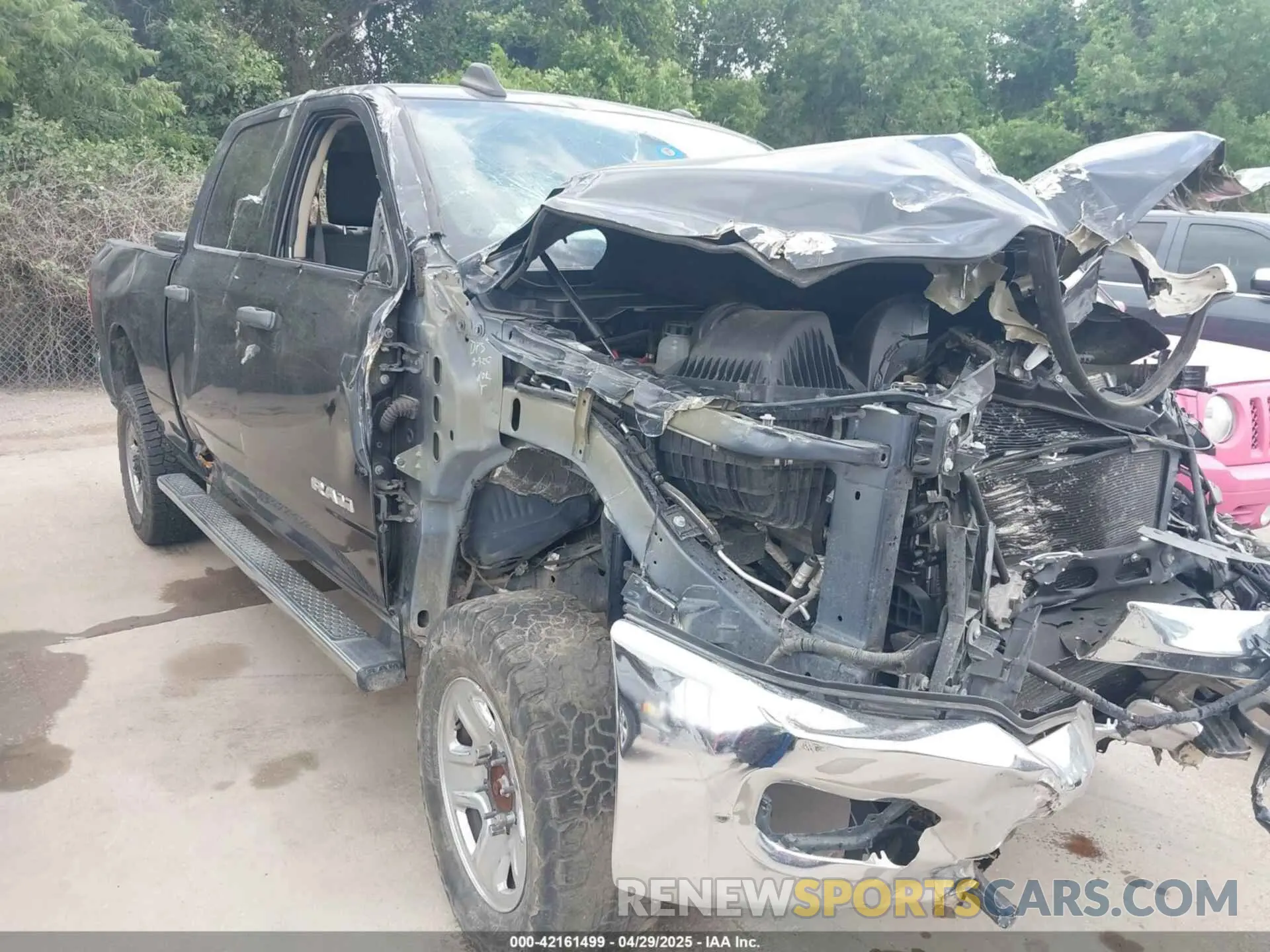 14 Photograph of a damaged car 3C6UR5CL9KG706769 RAM 2500 2019