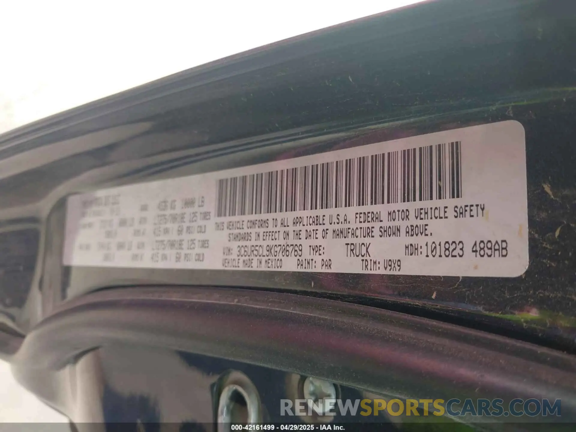 9 Photograph of a damaged car 3C6UR5CL9KG706769 RAM 2500 2019