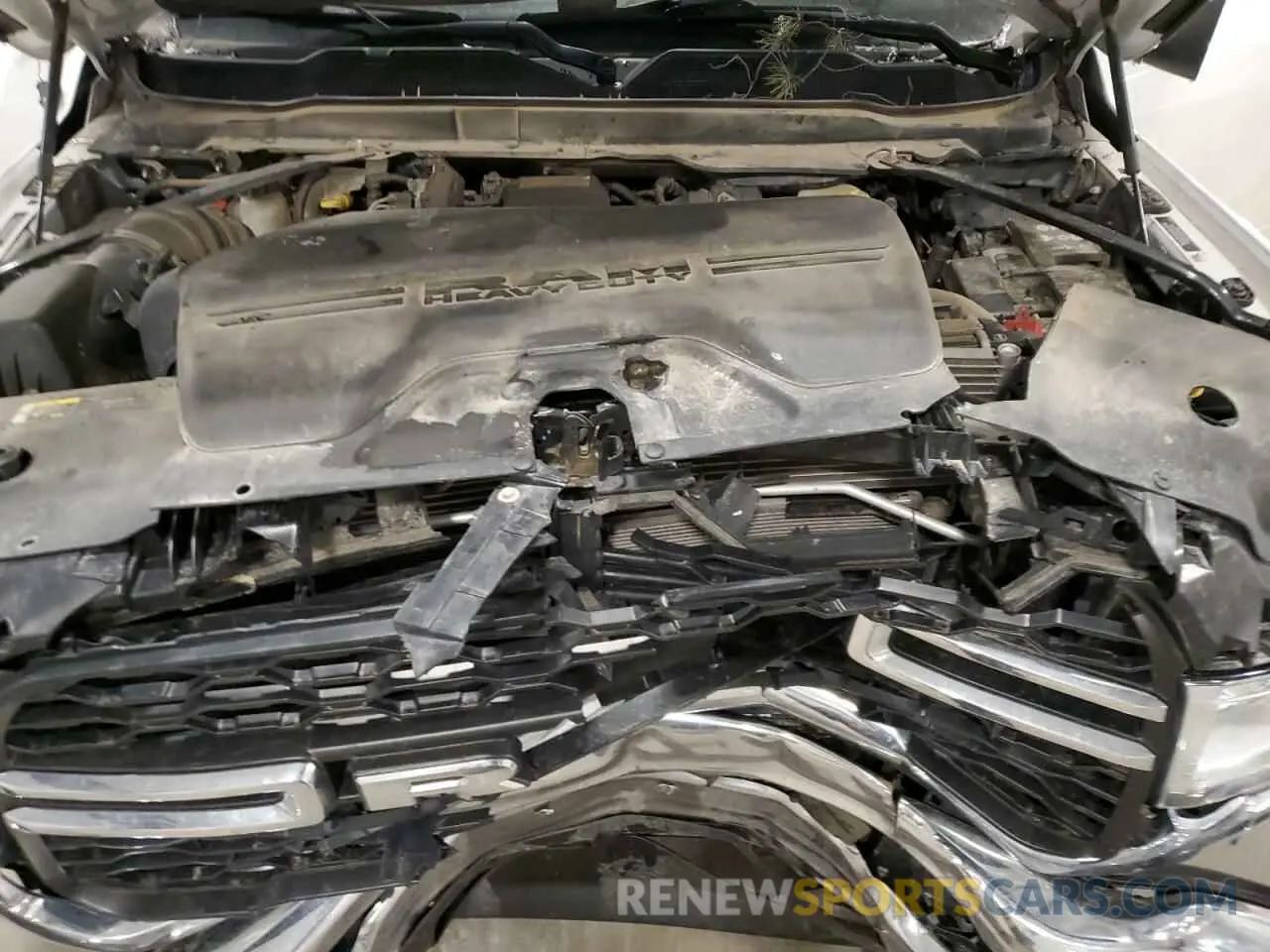 11 Photograph of a damaged car 3C6UR5CL9KG719814 RAM 2500 2019