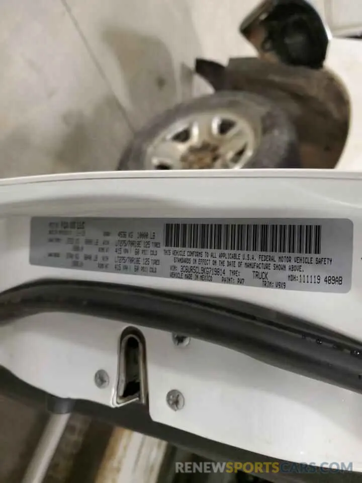 12 Photograph of a damaged car 3C6UR5CL9KG719814 RAM 2500 2019