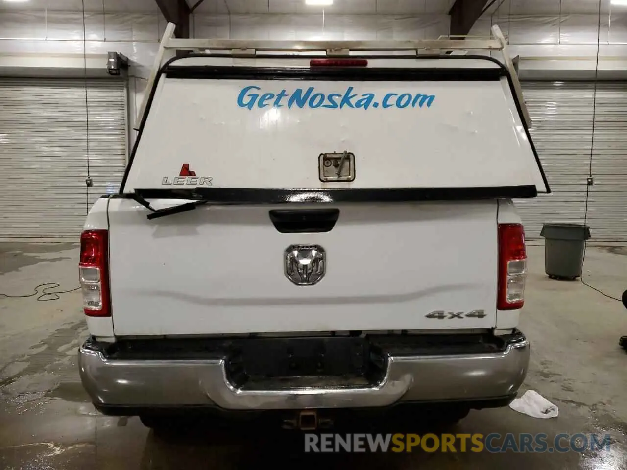 6 Photograph of a damaged car 3C6UR5CL9KG719814 RAM 2500 2019